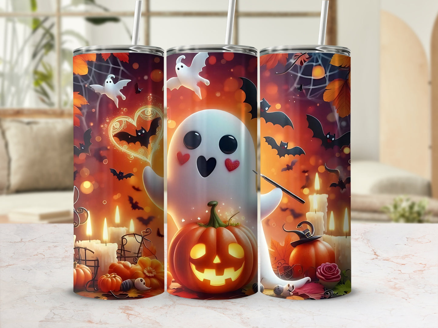 Halloween tumblers with ghosts, bats, pumpkins, and lit candles.