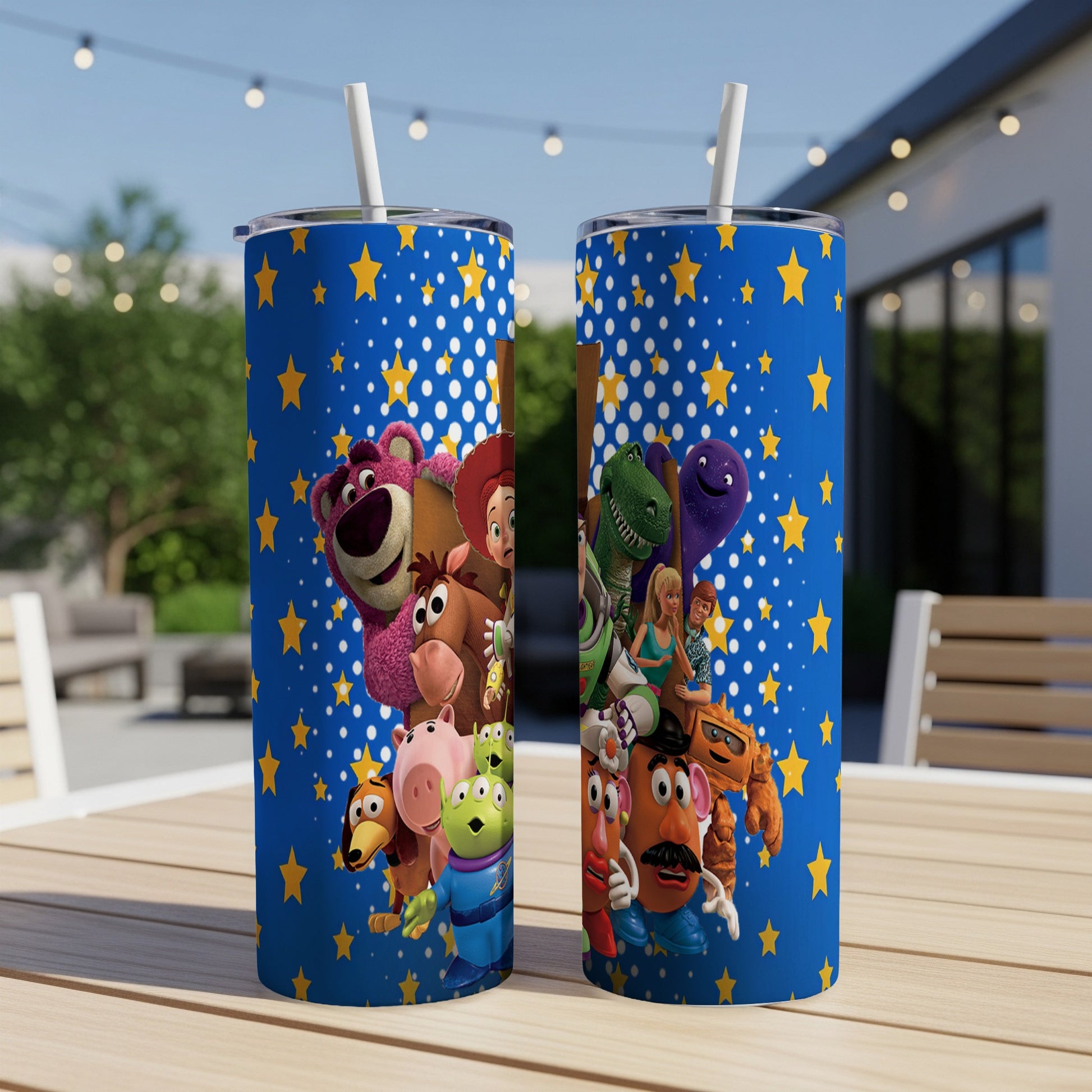 Toy Story characters on blue star-patterned tumblers with straws.