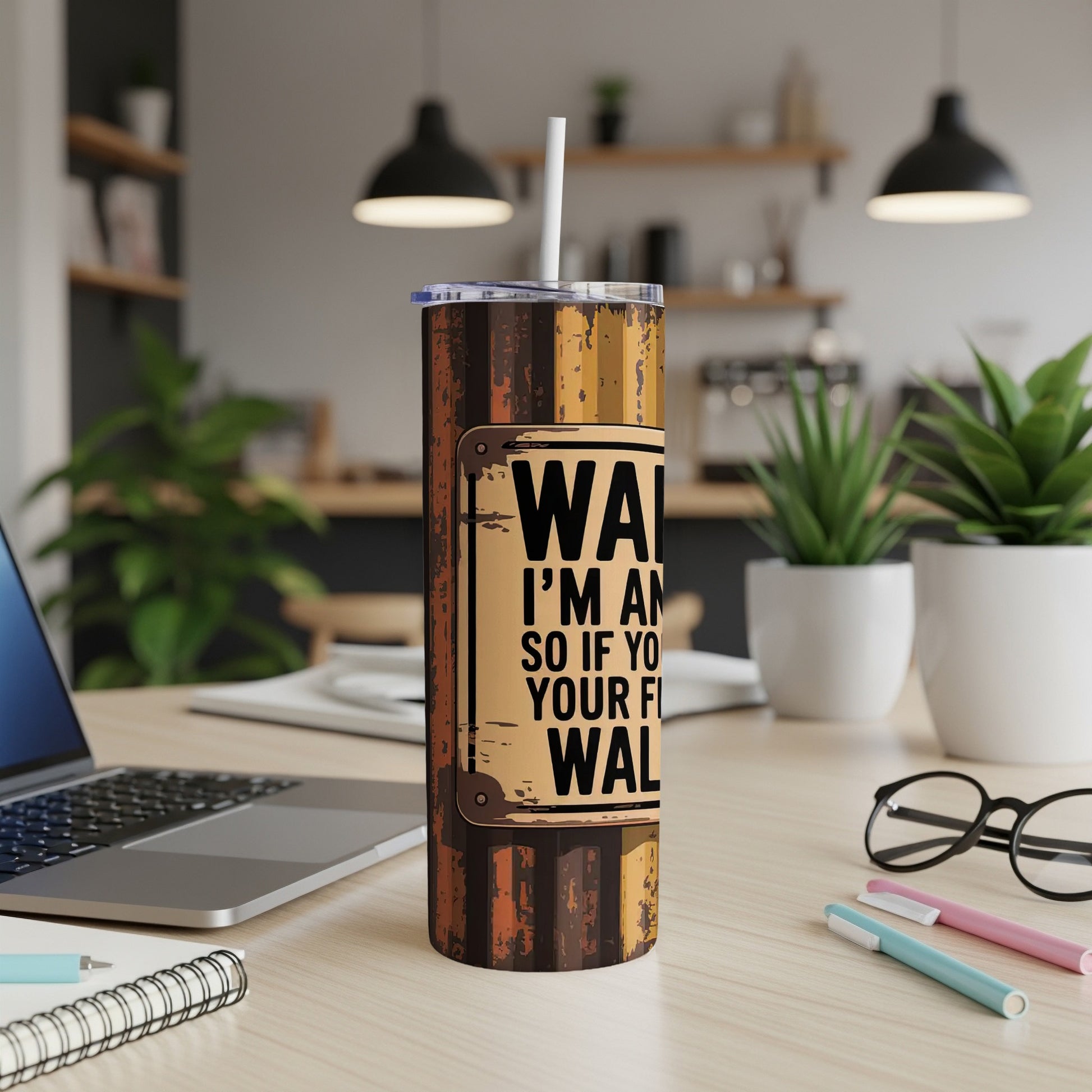 Distressed wooden sign on a tumbler that reads "WARNING I'M AN ARTIST SO IF YOU DON'T LIKE MY ART GET OUT OF MY STUDIO".