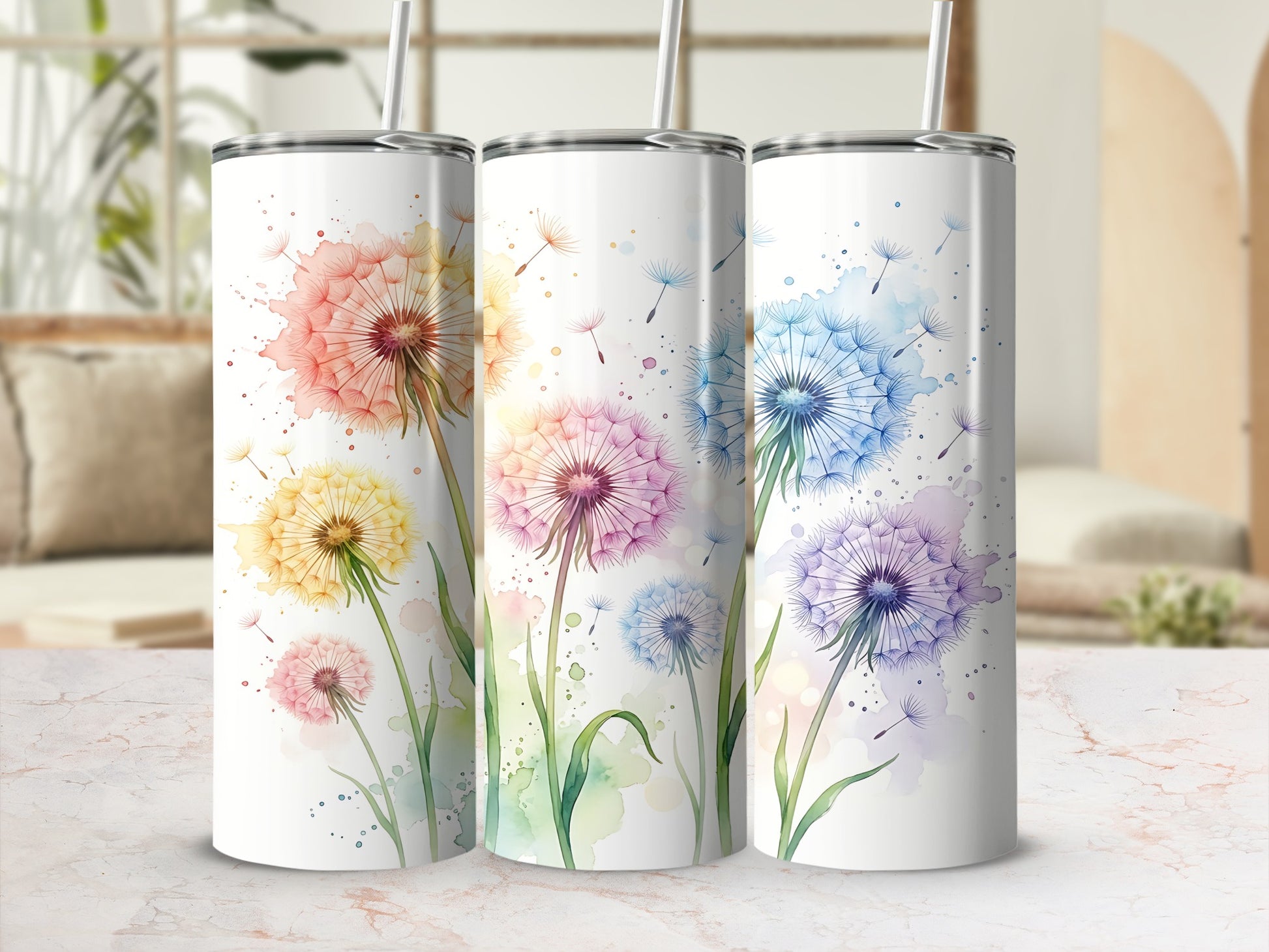 Three tumblers with colorful dandelion designs.
