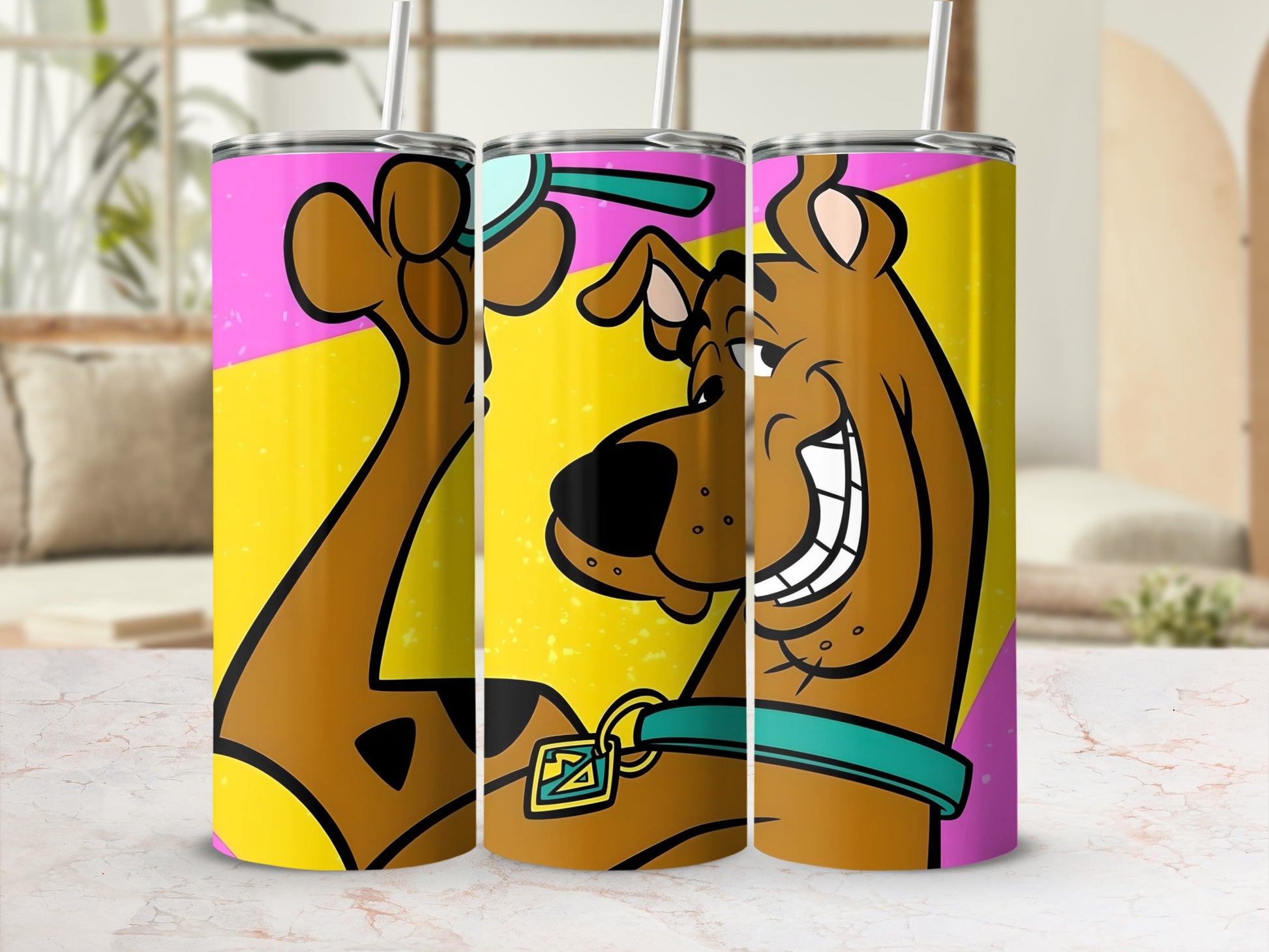 Scooby-Doo tumbler with a teal collar and pink and yellow background.