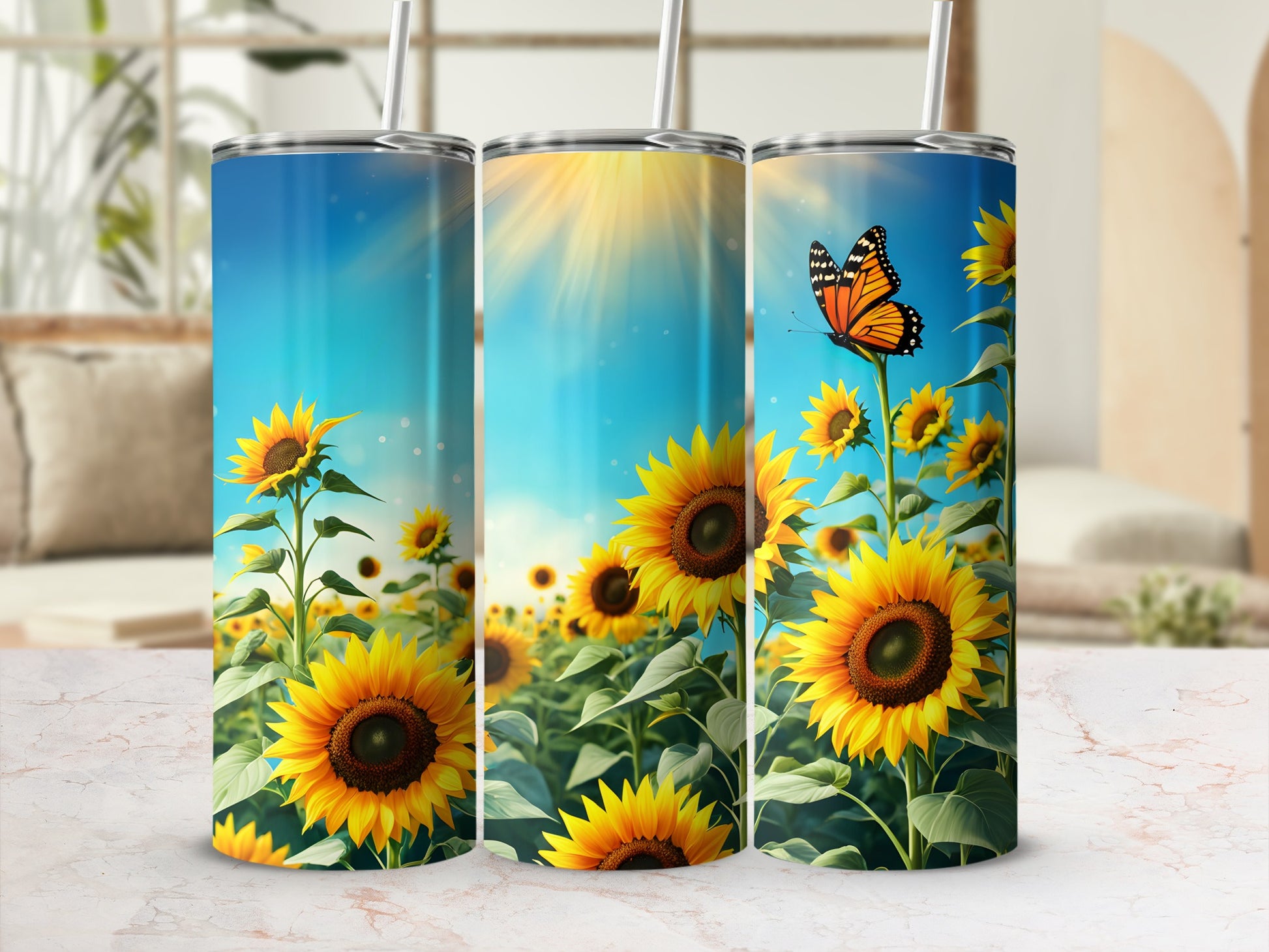 Three sunflower tumblers with a butterfly and sunny sky design.