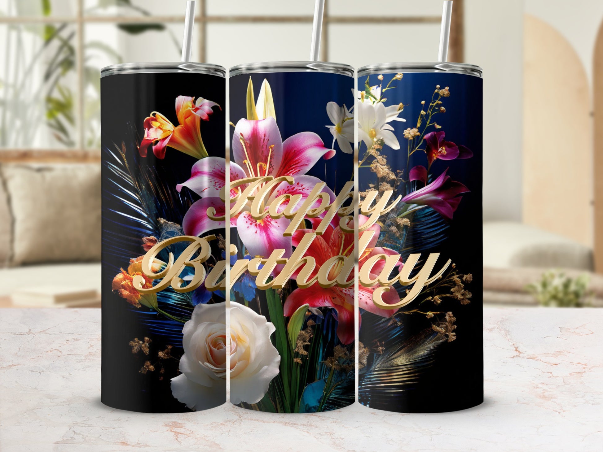 Three tall tumblers with floral designs and "Happy Birthday" text.