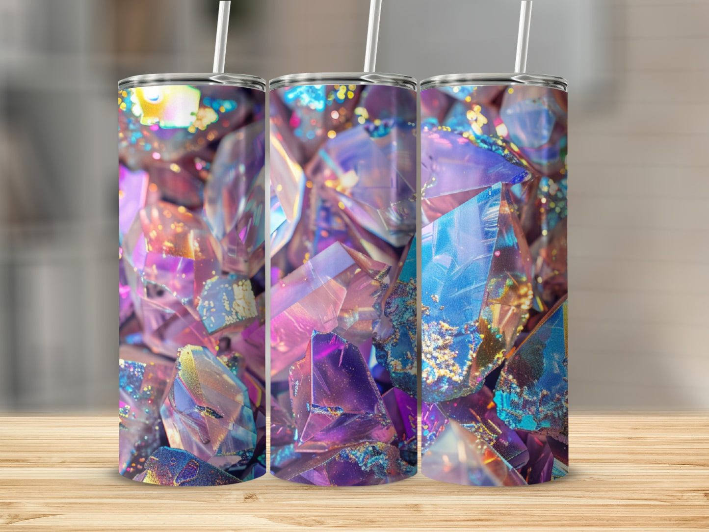 Three tumblers with a sparkling, faceted crystal design in purple and blue.