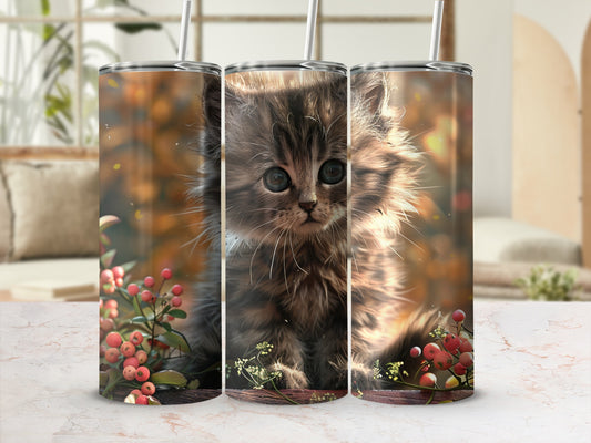 Fluffy kitten with berries on a tumbler wrap.