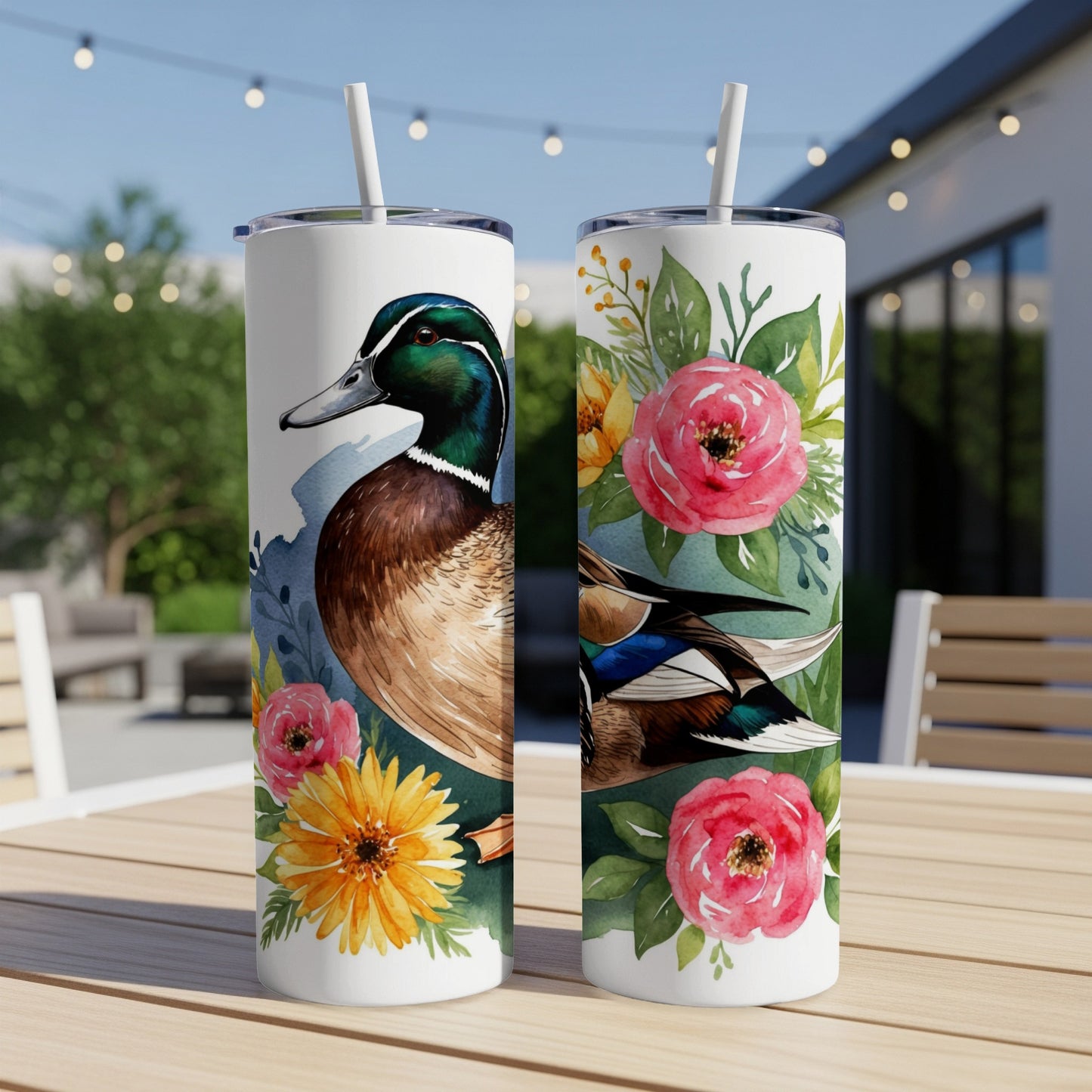 Two tumblers featuring a mallard duck and floral accents.