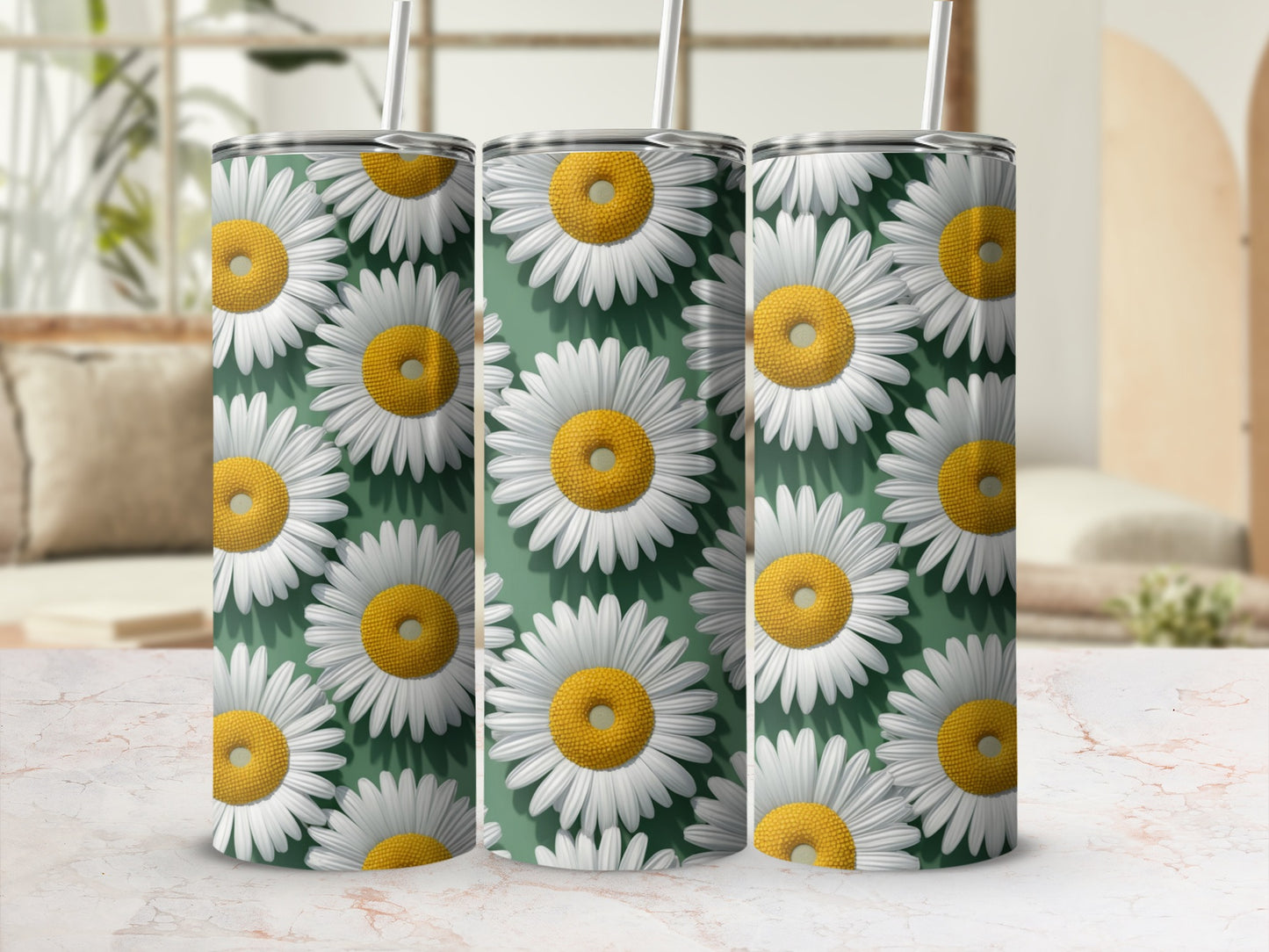 Three tumblers with a repeating daisy pattern on a green background.