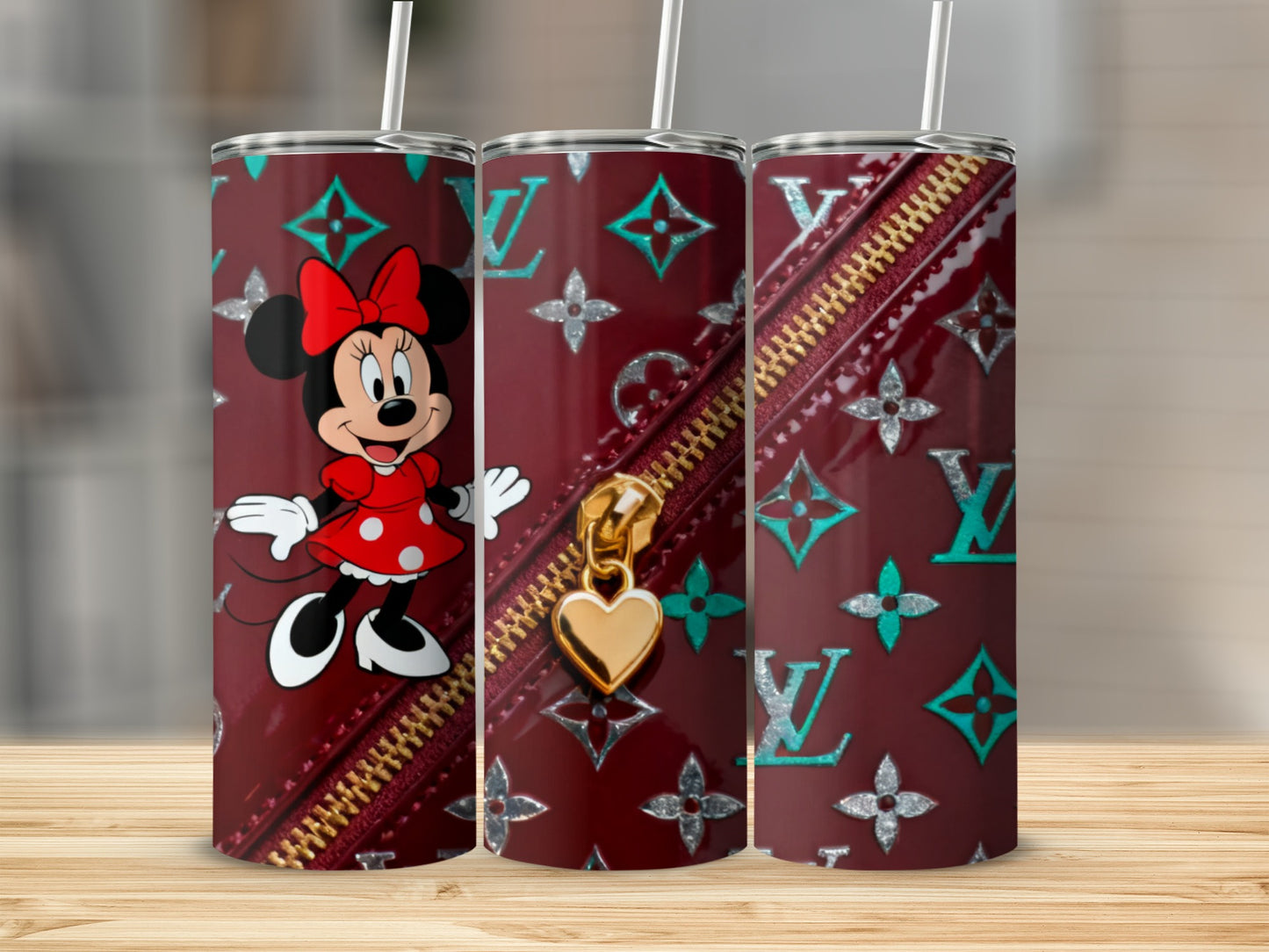 Minnie Mouse on a burgundy tumbler with gold zipper and LV pattern.