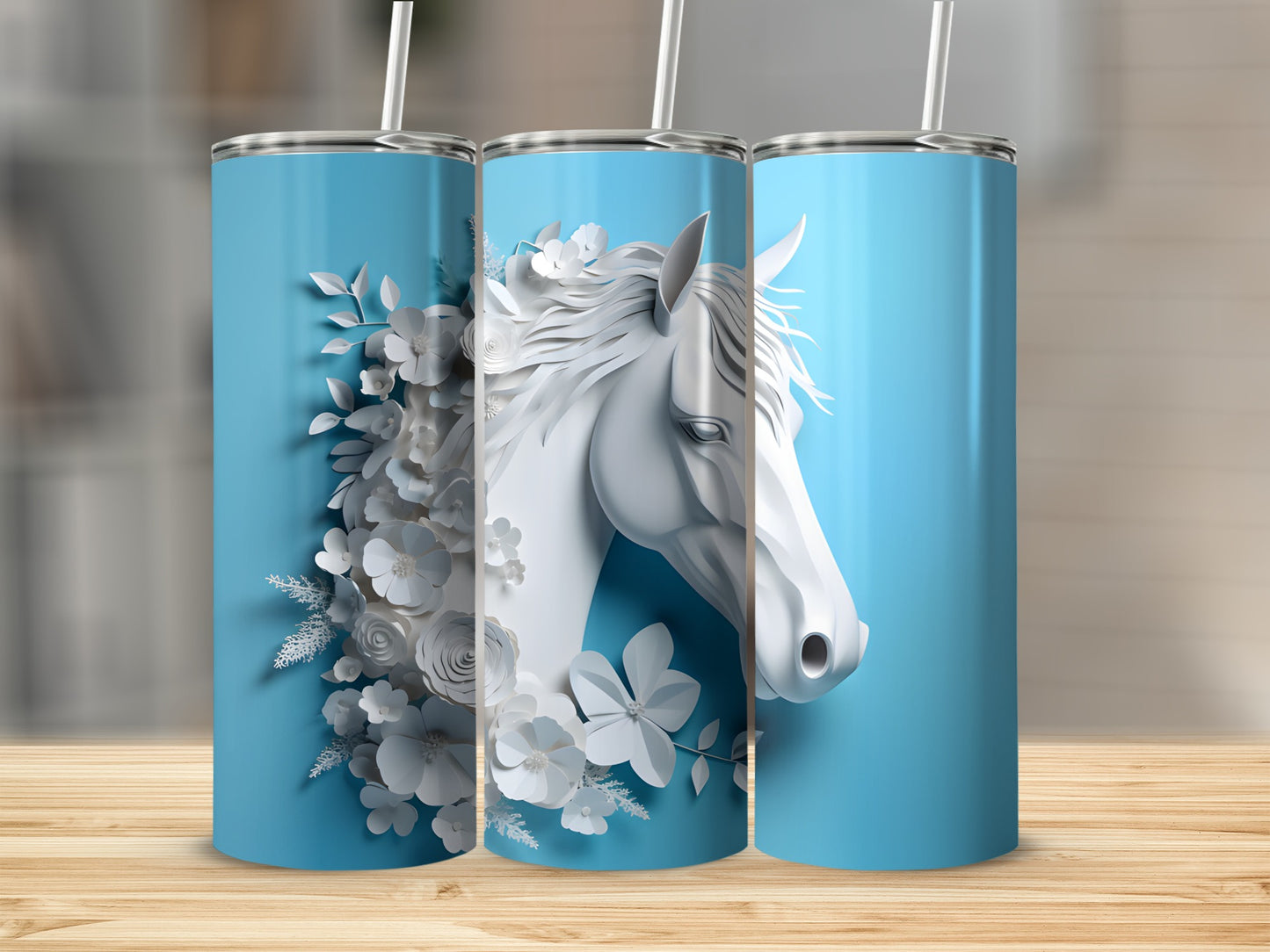 Blue tumbler with white horse and floral design.