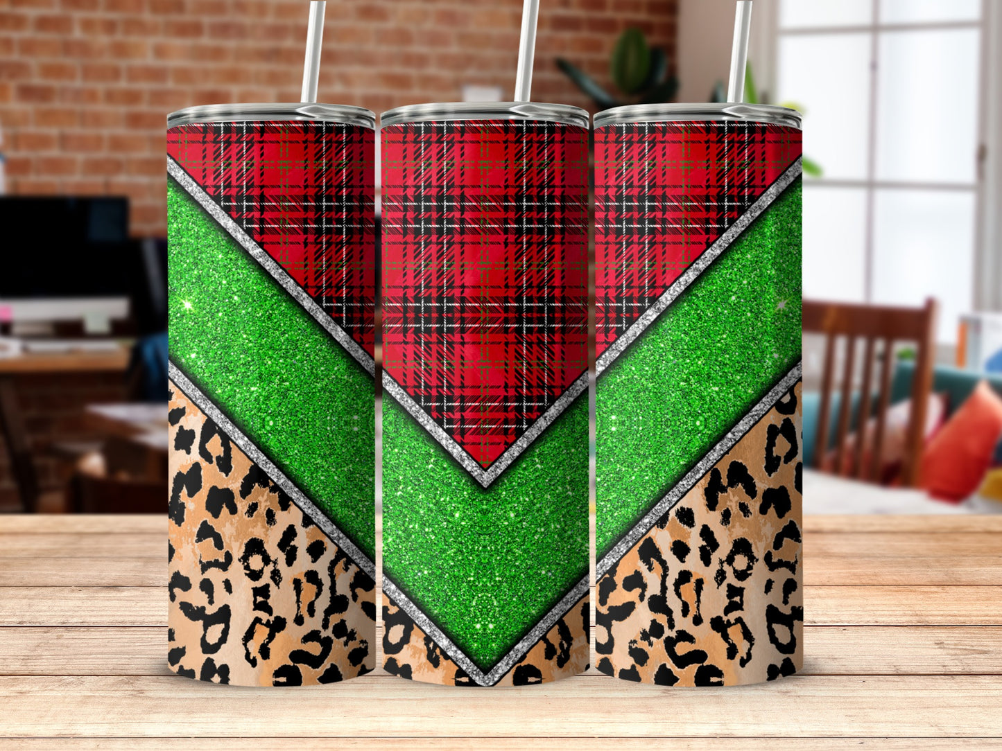 Three tumblers with plaid, glitter, and leopard print designs.