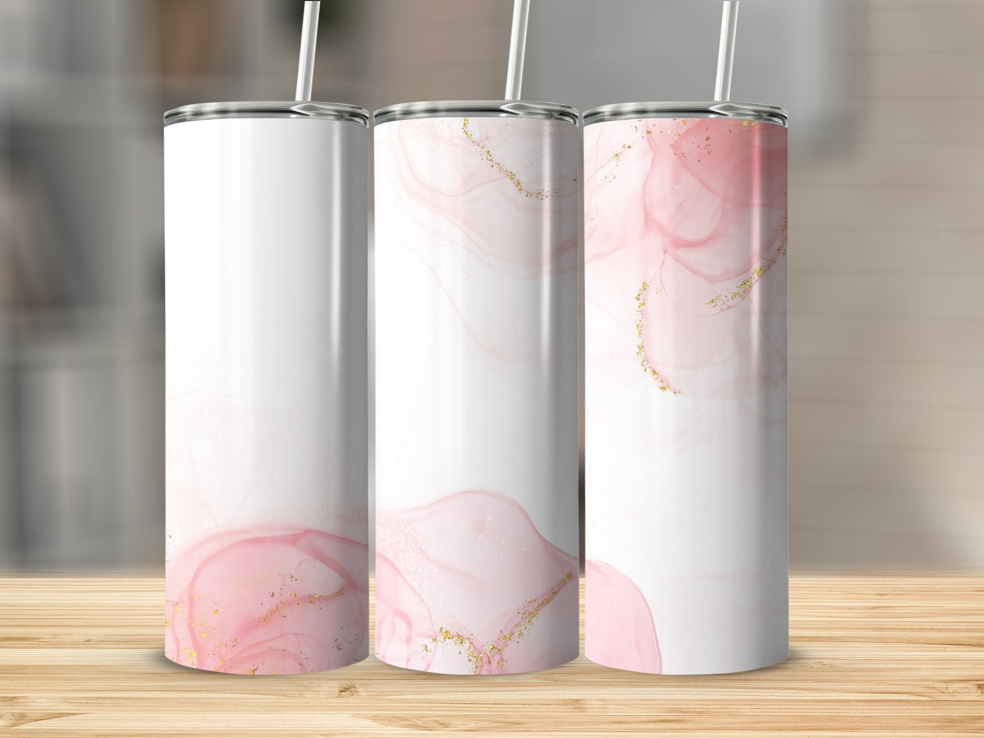 Three white tumblers with pink and gold abstract watercolor design.