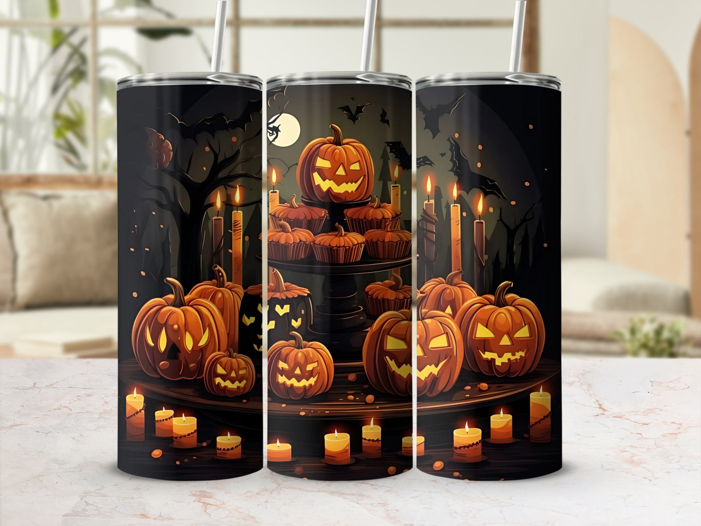 Tumbler with a Halloween design of pumpkins, candles, bats, and a spooky tree.