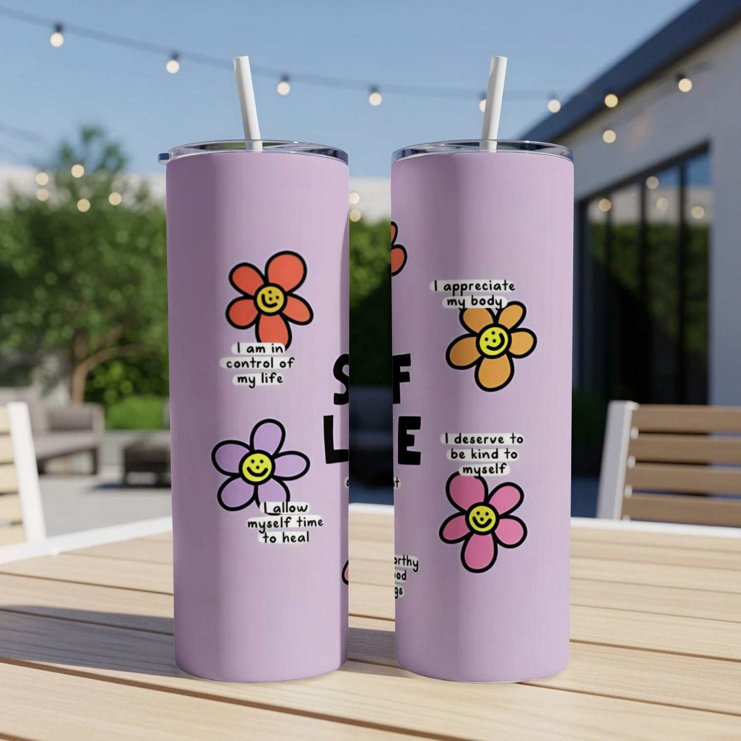 Two purple tumblers with floral affirmations about self-love.