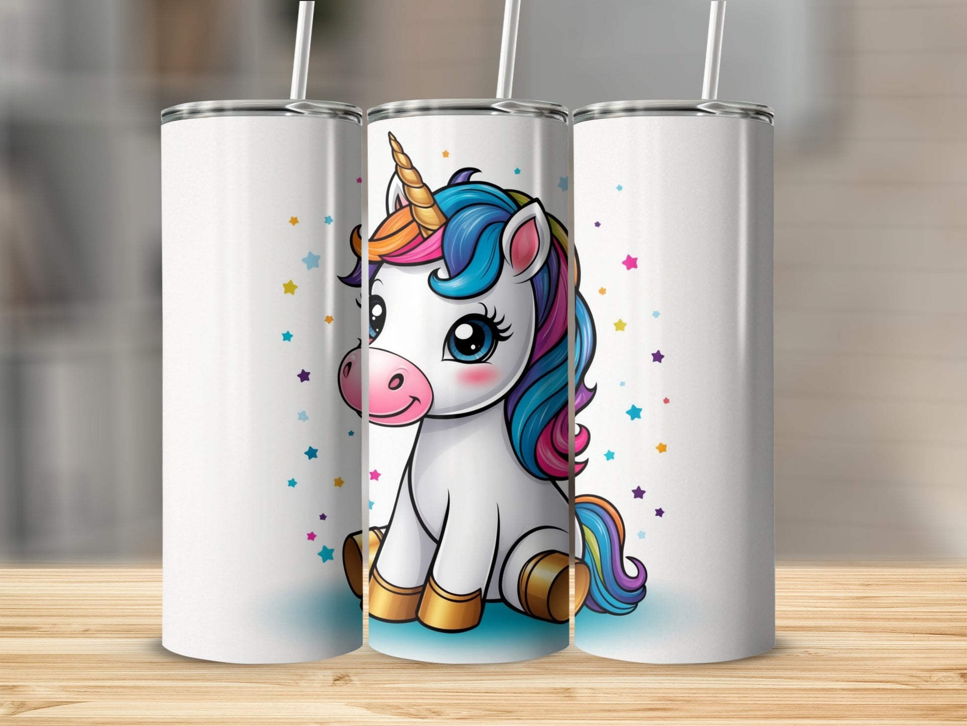 White tumbler with a cartoon unicorn and colorful stars.