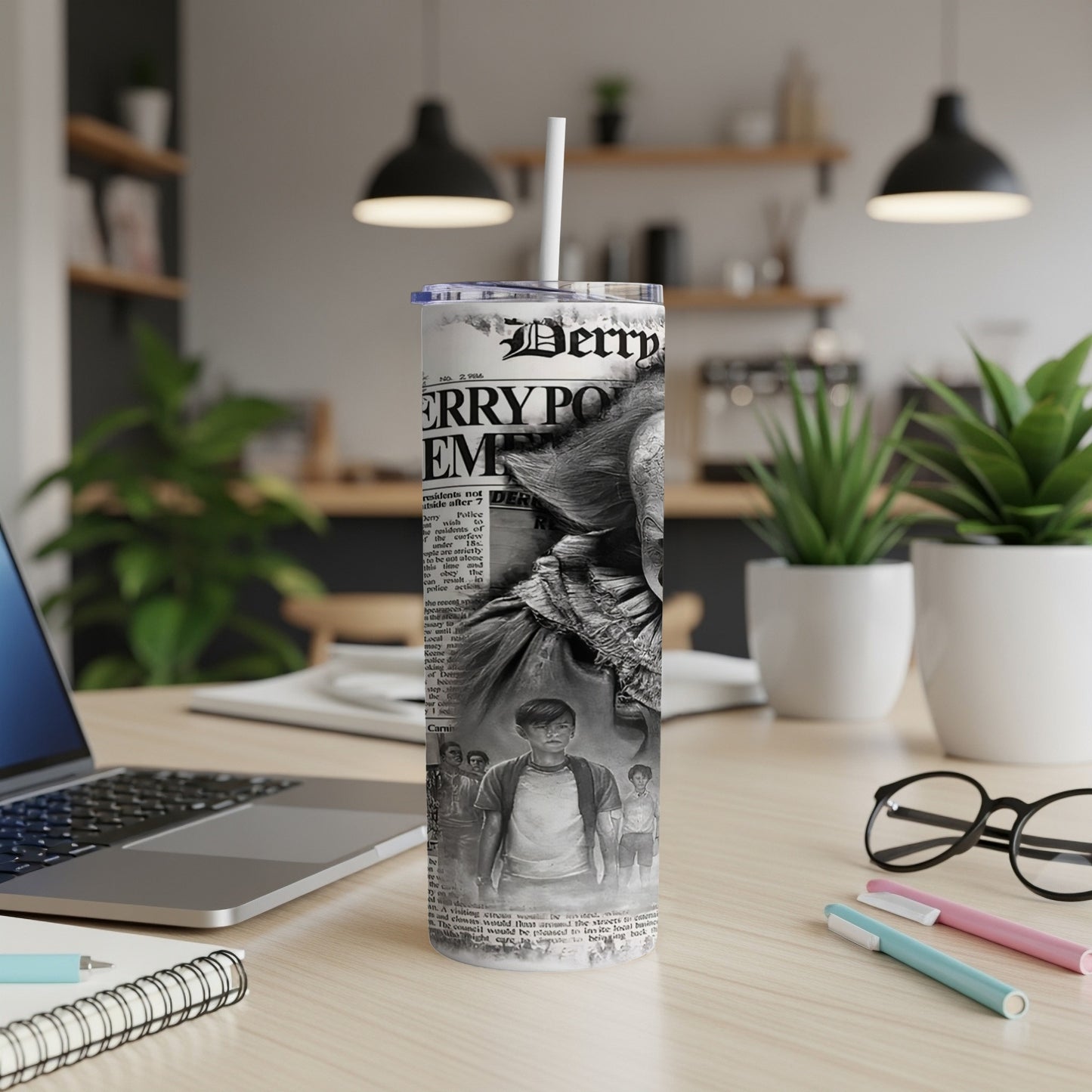 Tumbler with Derry Police Department and clown face design.