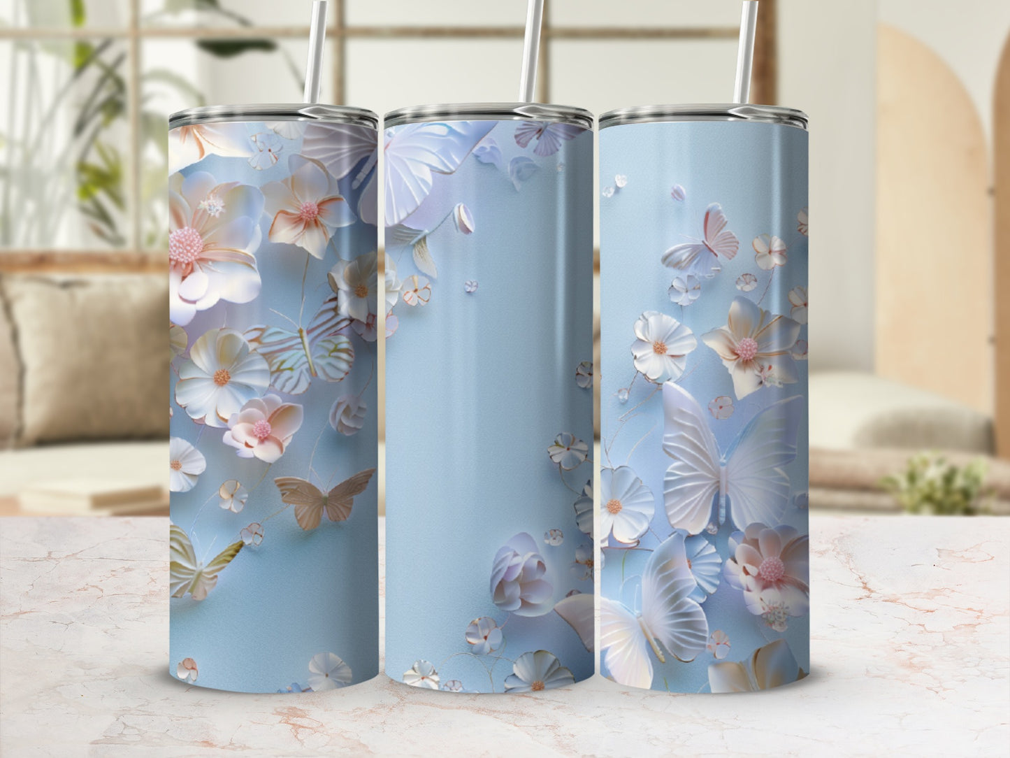 Light blue tumbler with delicate floral and butterfly design.