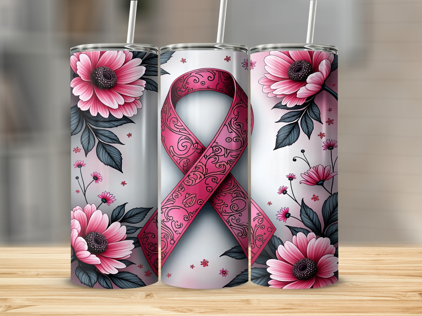 Pink ribbon with flowers on a stainless steel tumbler.