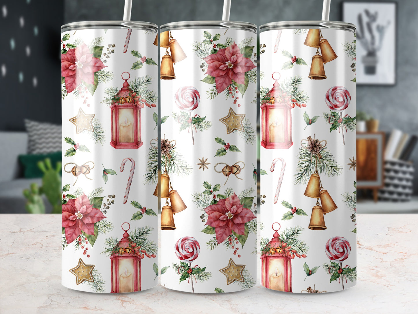 Holiday tumbler with poinsettias, lanterns, bells, candy canes, and stars.