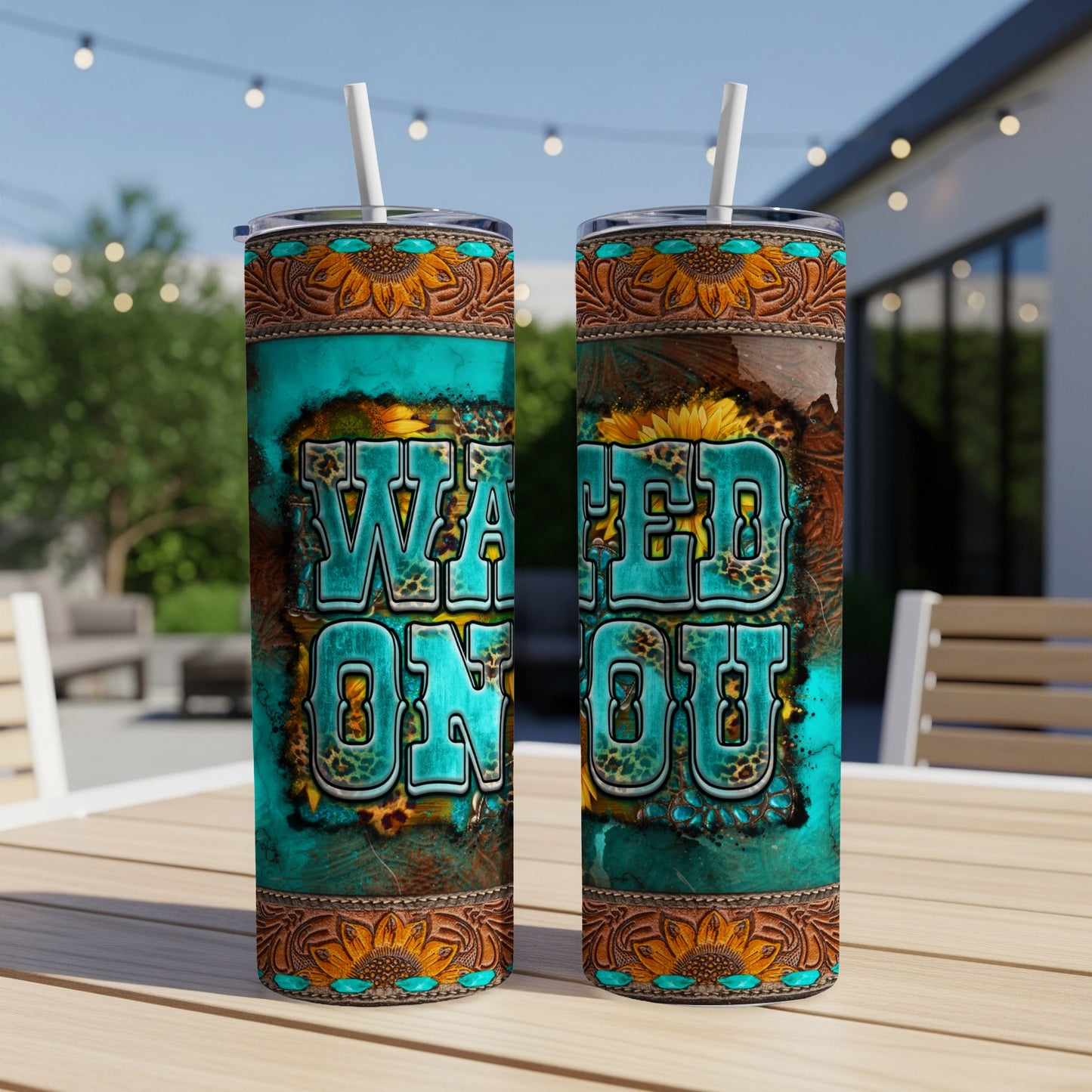 Two turquoise and leopard print tumblers with "WATERED ON OU" text.