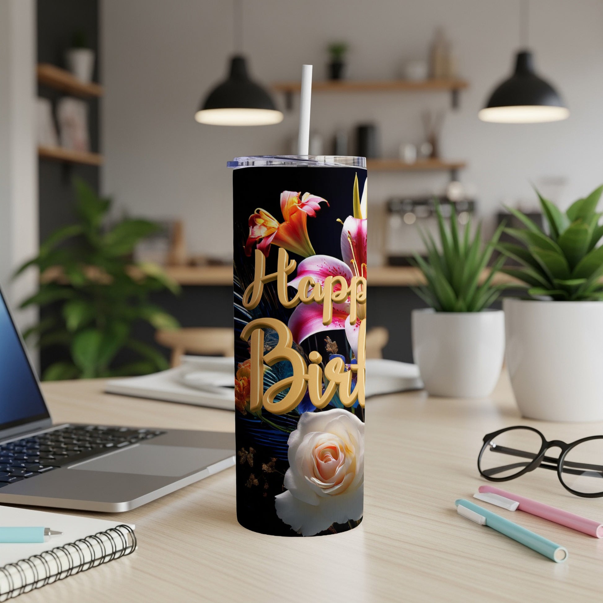 Tall tumbler with "Happy Birthday" text surrounded by flowers and a peacock feather.