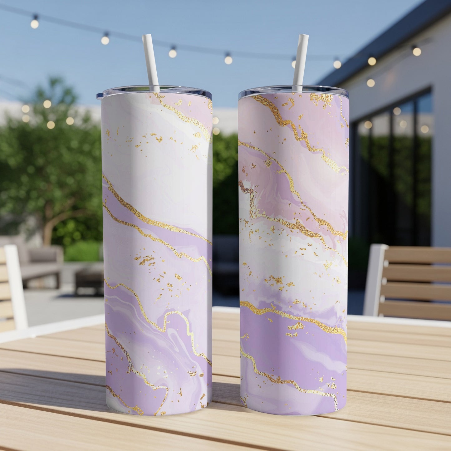 Two tall tumblers with purple and white marble pattern and gold accents.