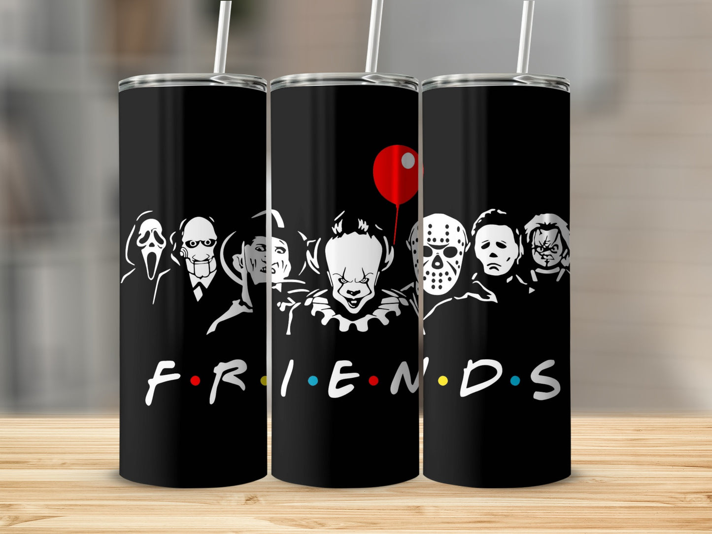 Black tumblers with horror characters and the Friends logo.