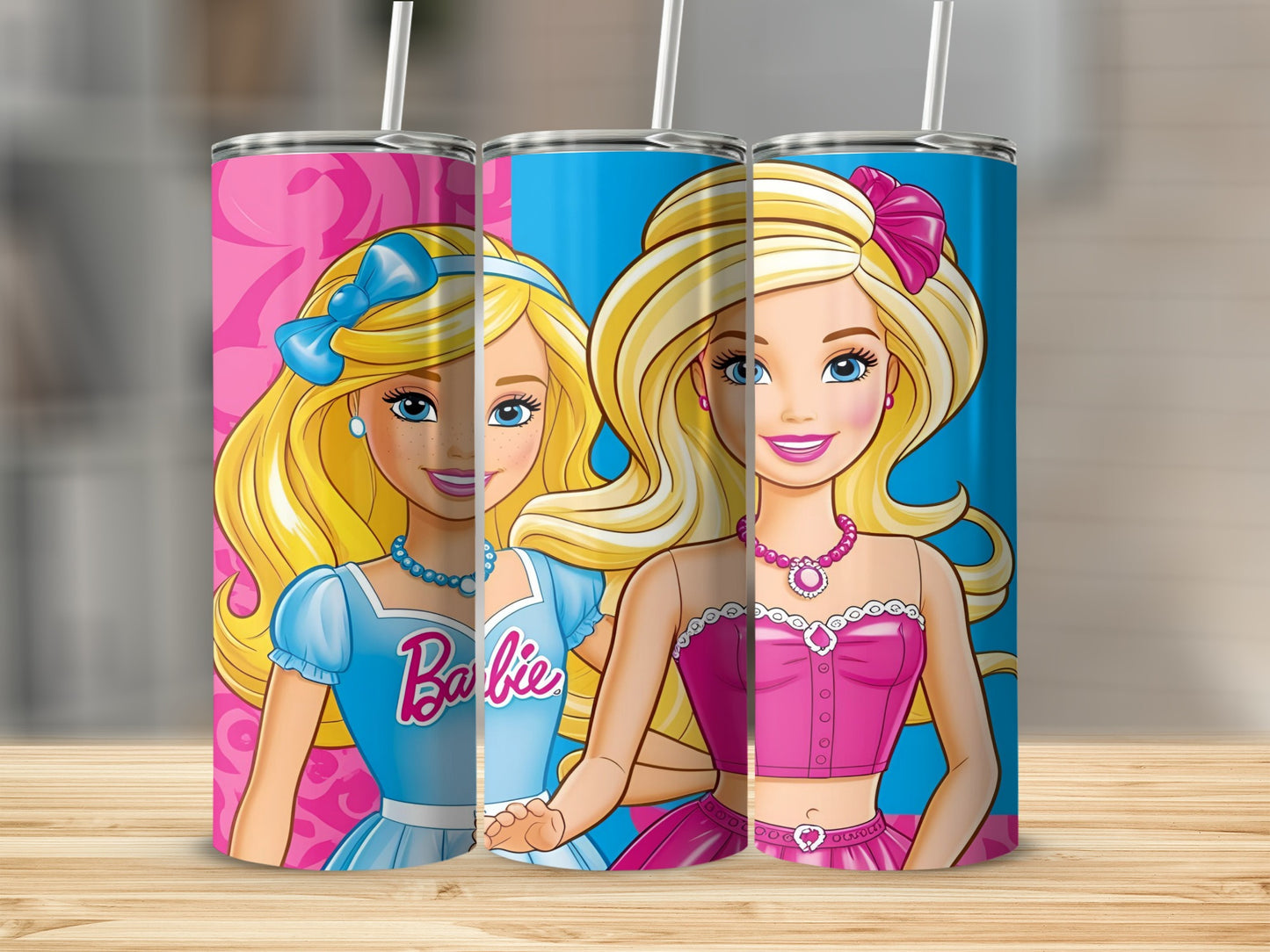 Three Barbie tumblers with pink and blue backgrounds and pink lids.