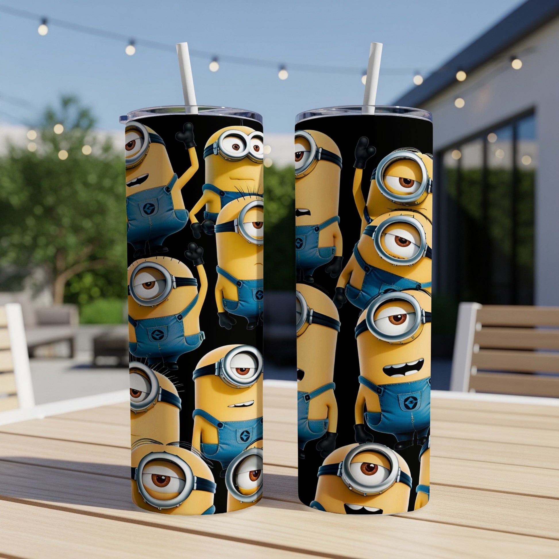 Two Minions tumblers with straw on a wooden table.