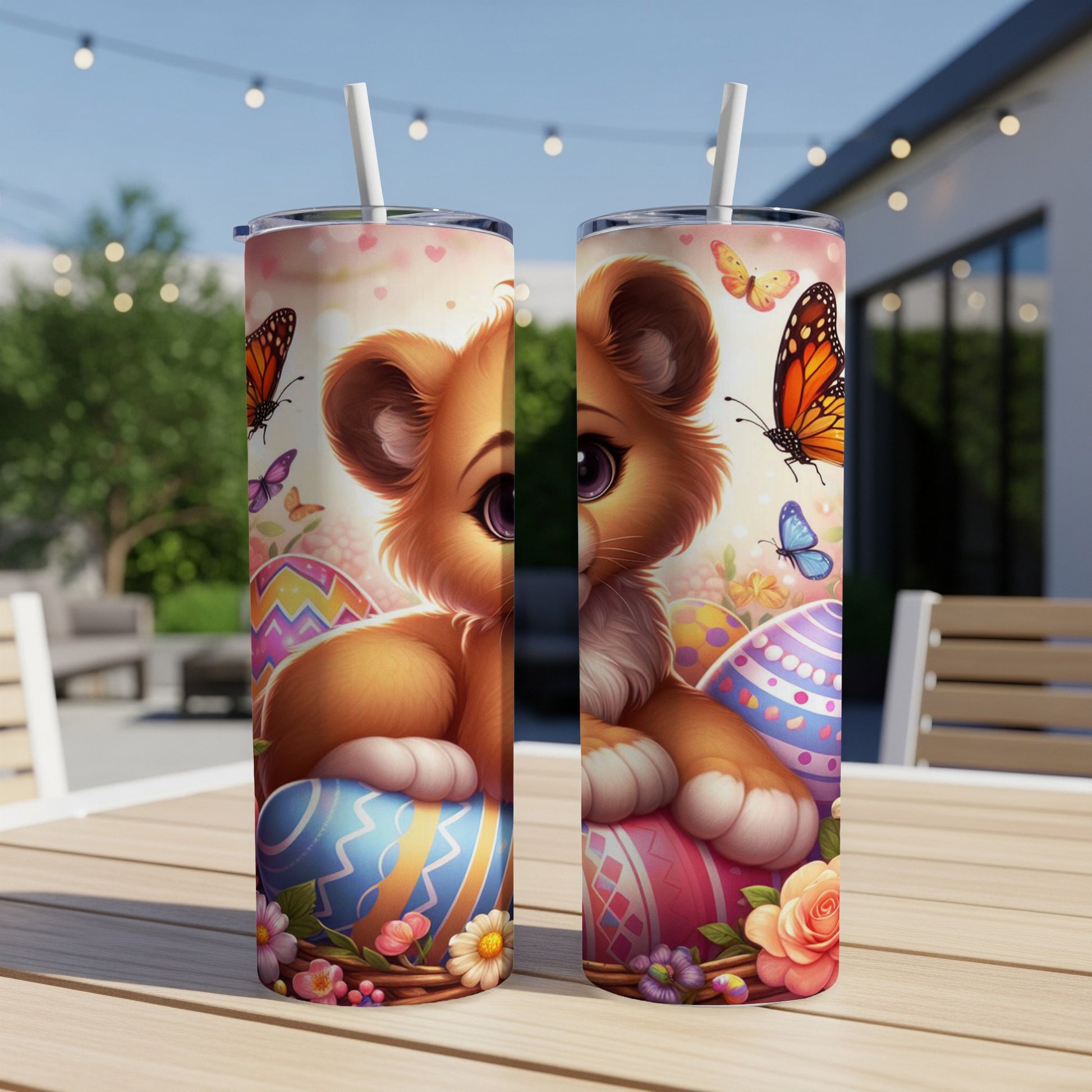 Cute lion cub with Easter eggs and butterflies on a tumbler.