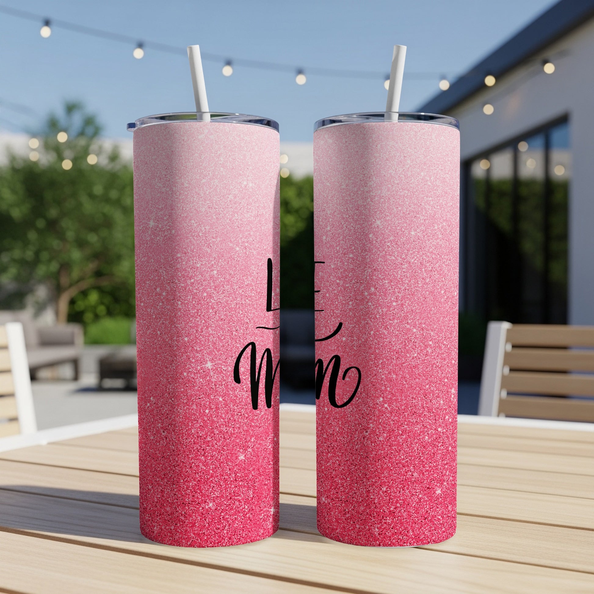 Two tall tumblers with pink glitter gradient and "Love Mom" text.