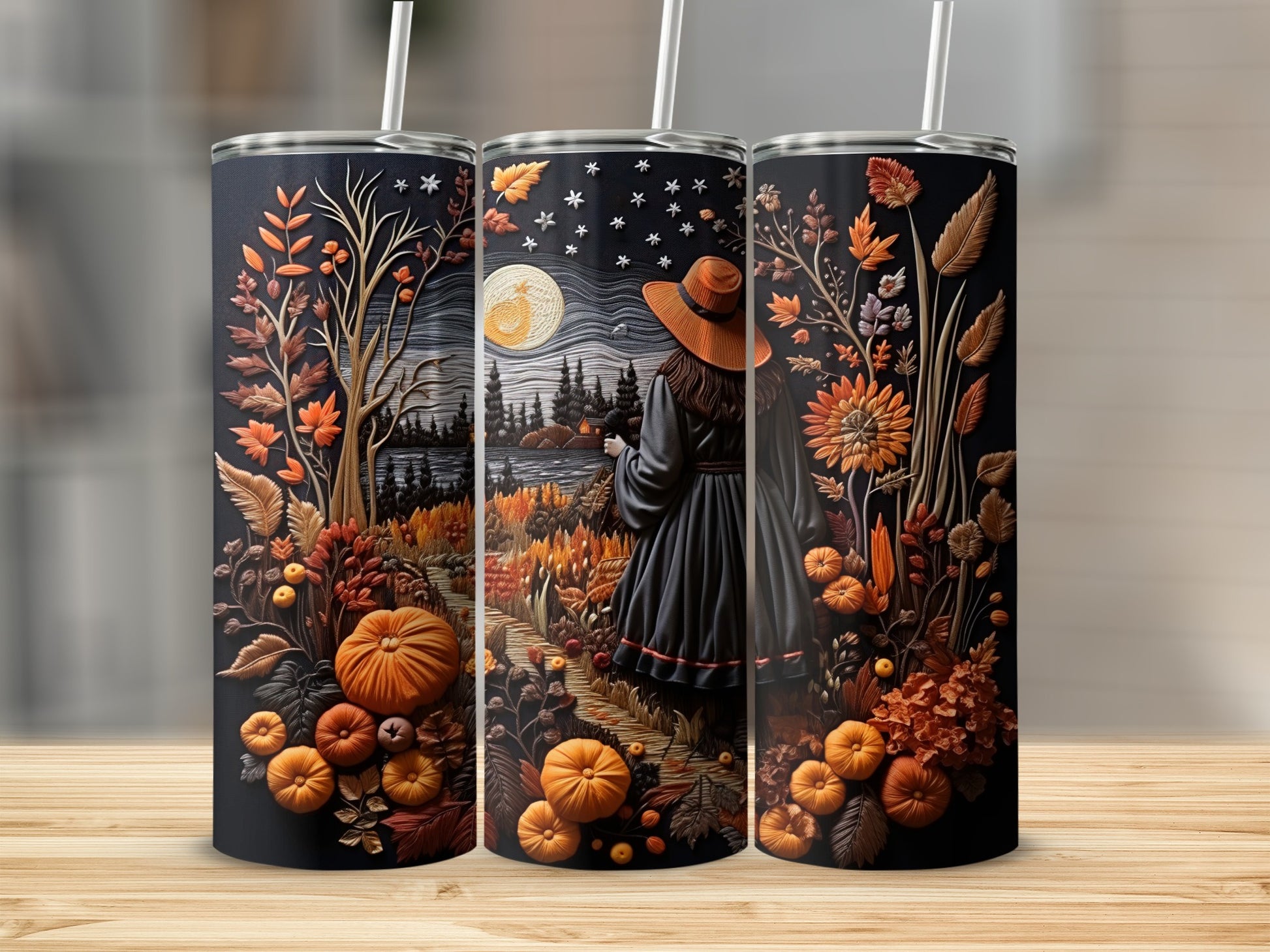 Three tumblers with a fall harvest witchy landscape design, featuring pumpkins, autumn leaves, and a moonlit night scene.