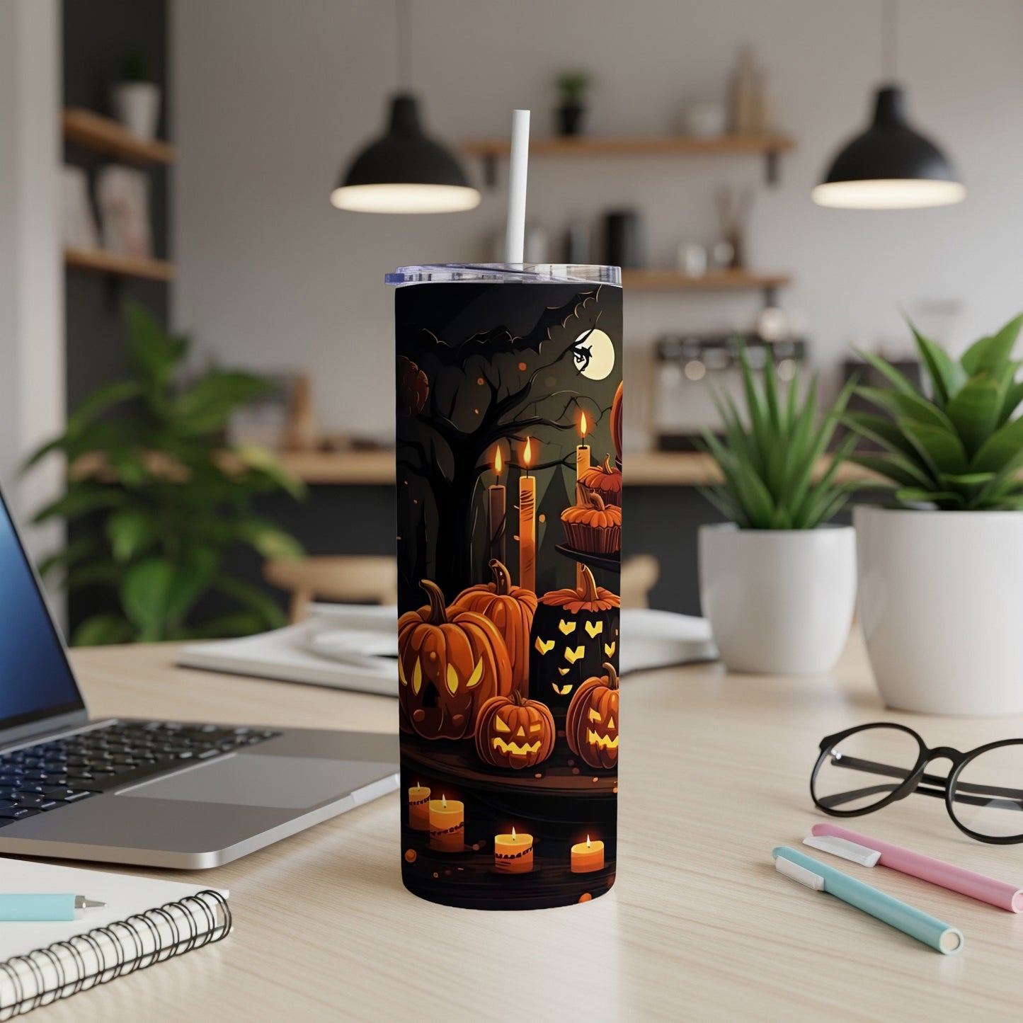 Tumbler with Halloween pumpkins and candles design, featuring a full moon and bats.