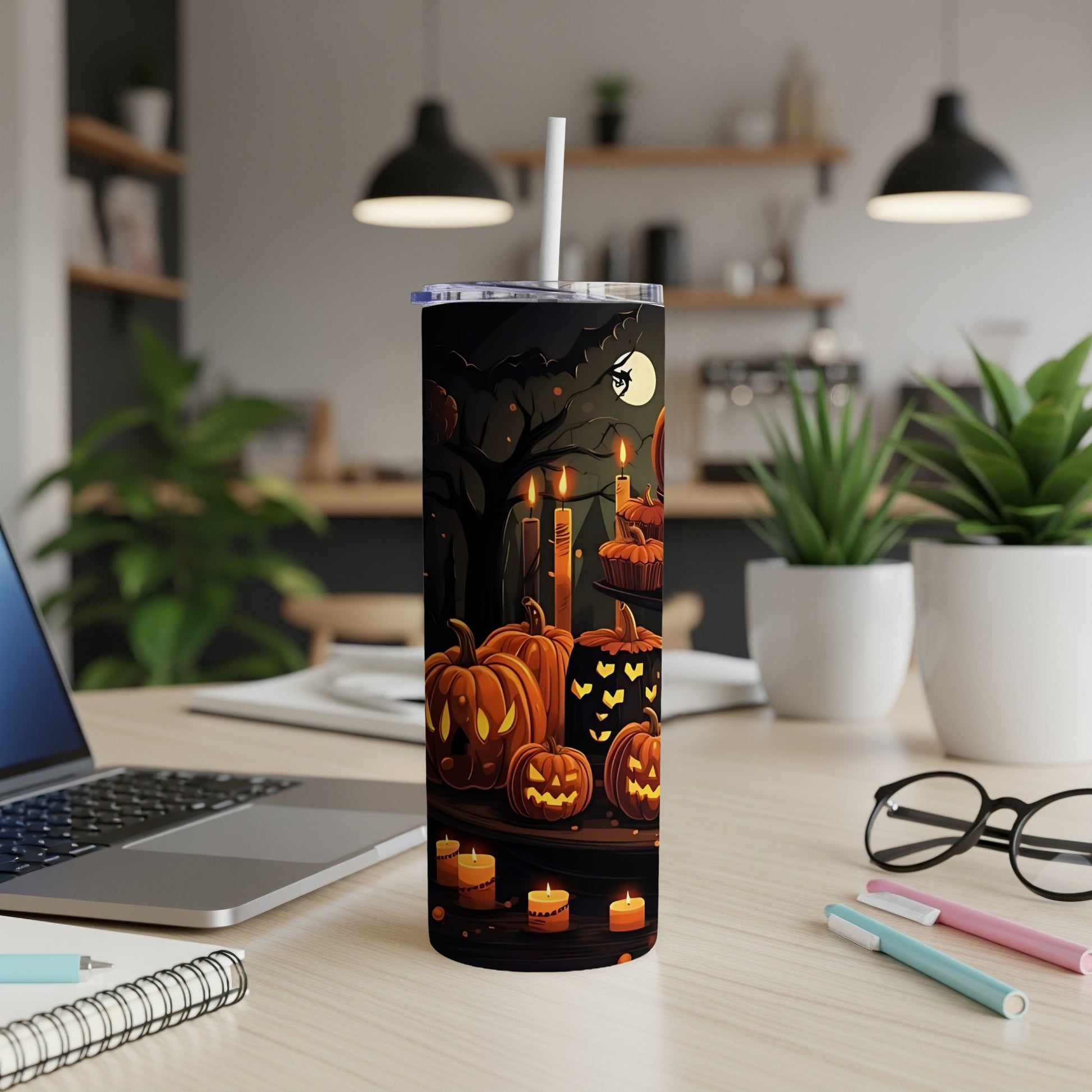 Tumbler with Halloween pumpkins and candles design, featuring a full moon and bats.