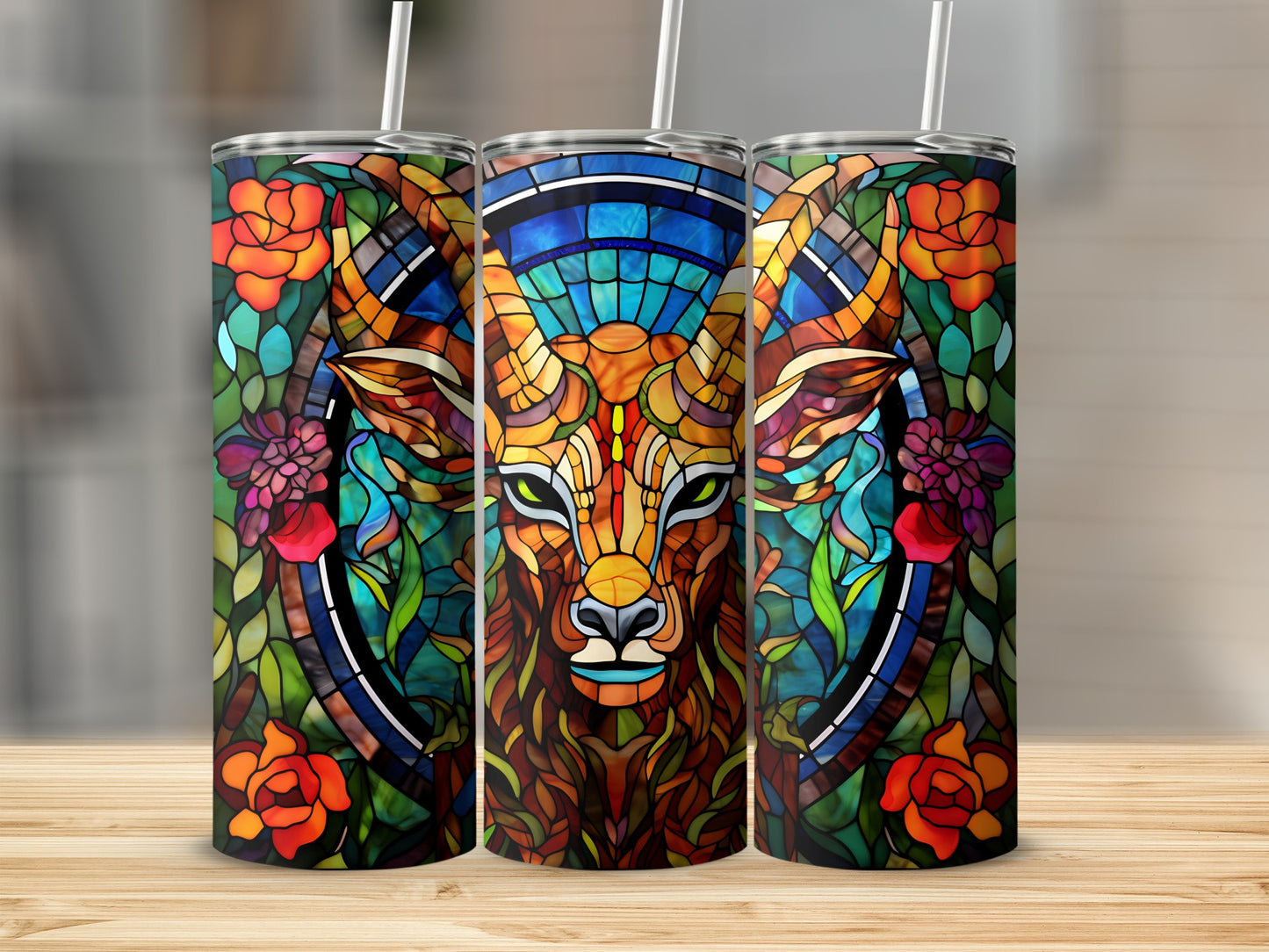 Triptych of tumblers with stained glass deer and floral designs.