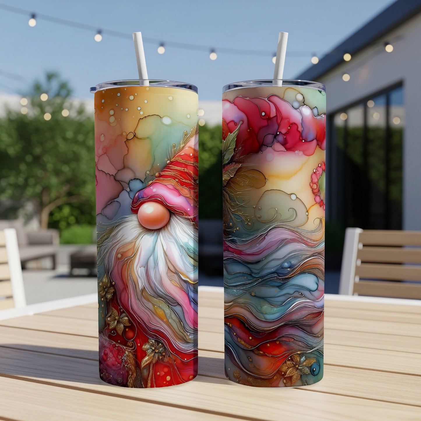 Two tumblers with gnome and abstract floral art designs.