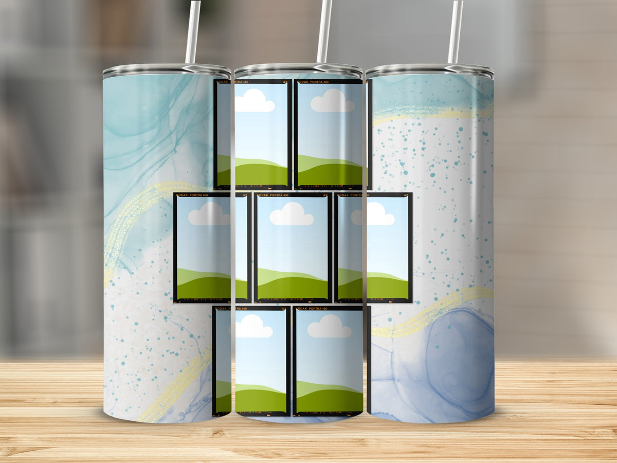 Tumbler with abstract blue watercolor design and multiple film strip photo placeholders.