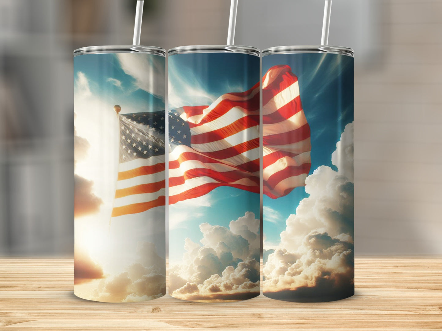 American flag tumbler with white straw on a wooden surface.