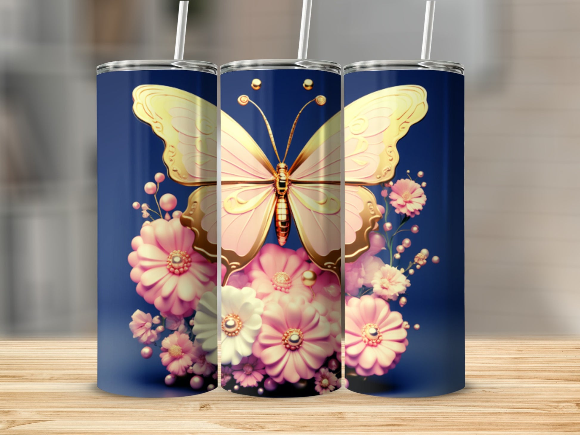 Three tumblers with a golden butterfly and pink flowers on a navy background.