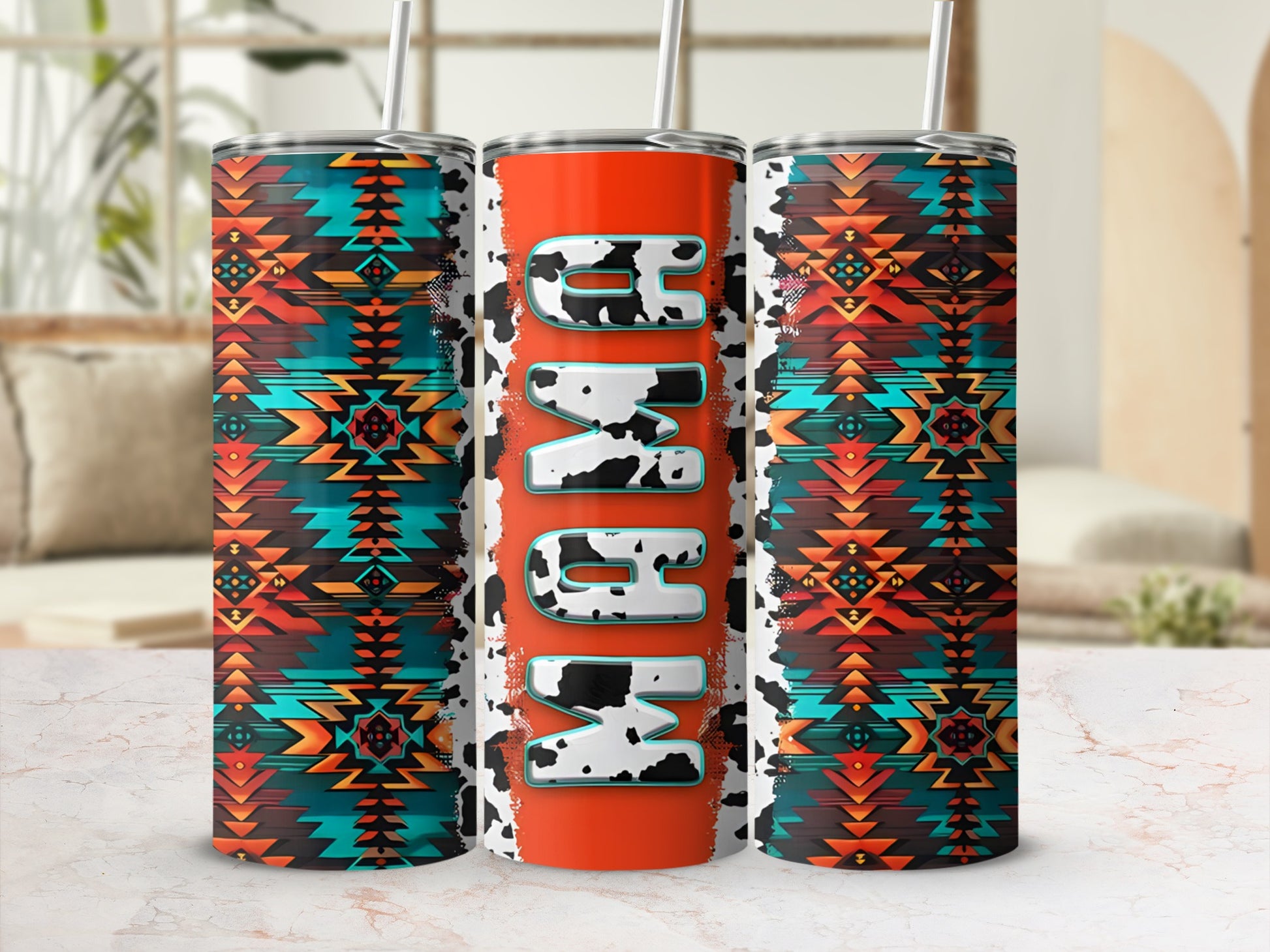 Three tumblers with Southwestern geometric patterns and cow print accents.