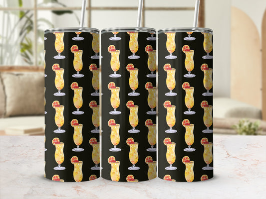 Tumbler with a repeating pattern of orange juice cocktails with straws.