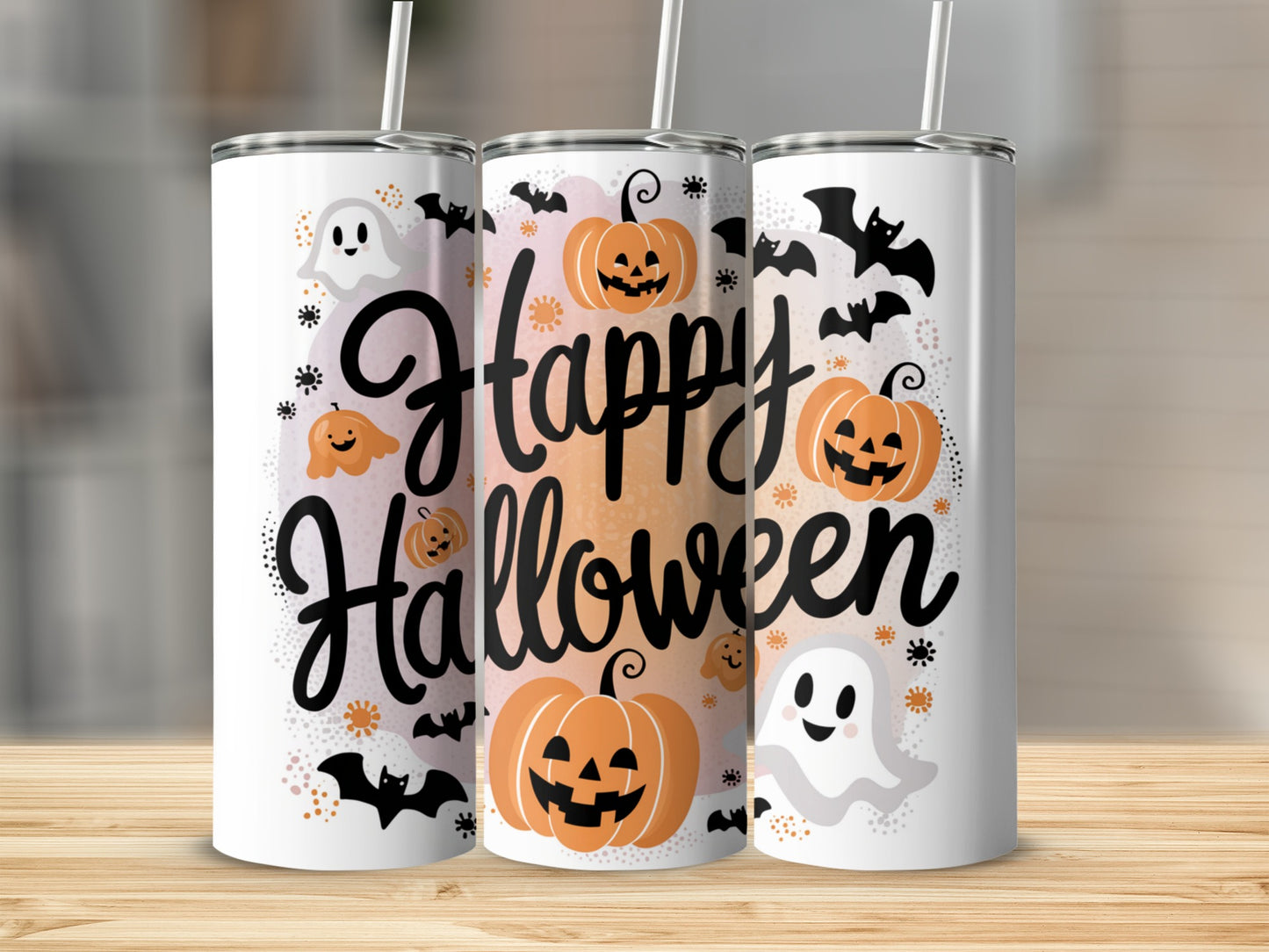 Three tumblers with a "Happy Halloween" design featuring pumpkins, ghosts, and bats.