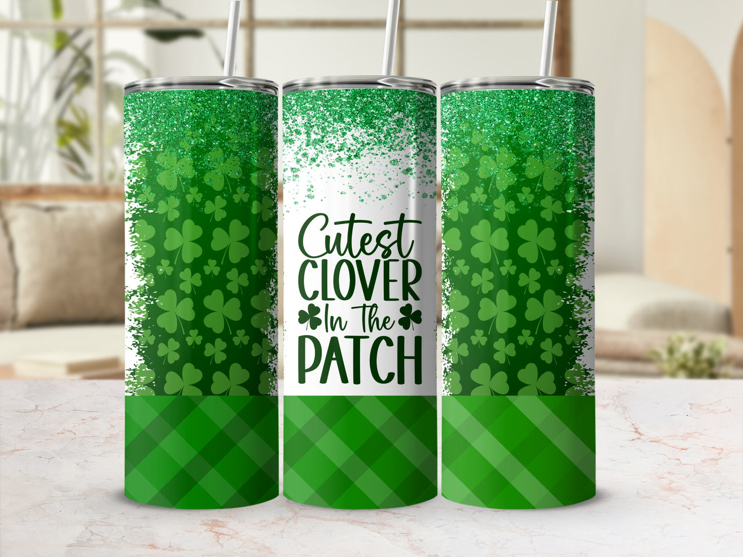 Green glitter and shamrock tumbler with "Cutest Clover in the Patch" text.