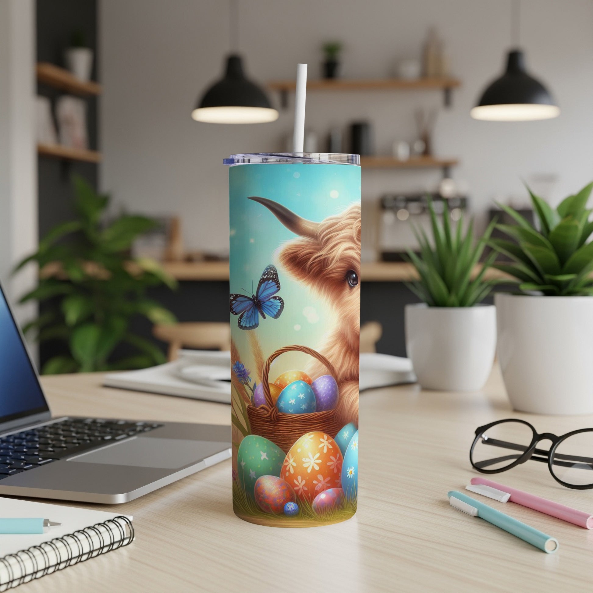 Humorous Highland cow with Easter eggs and butterfly on a blue gradient tumbler.
