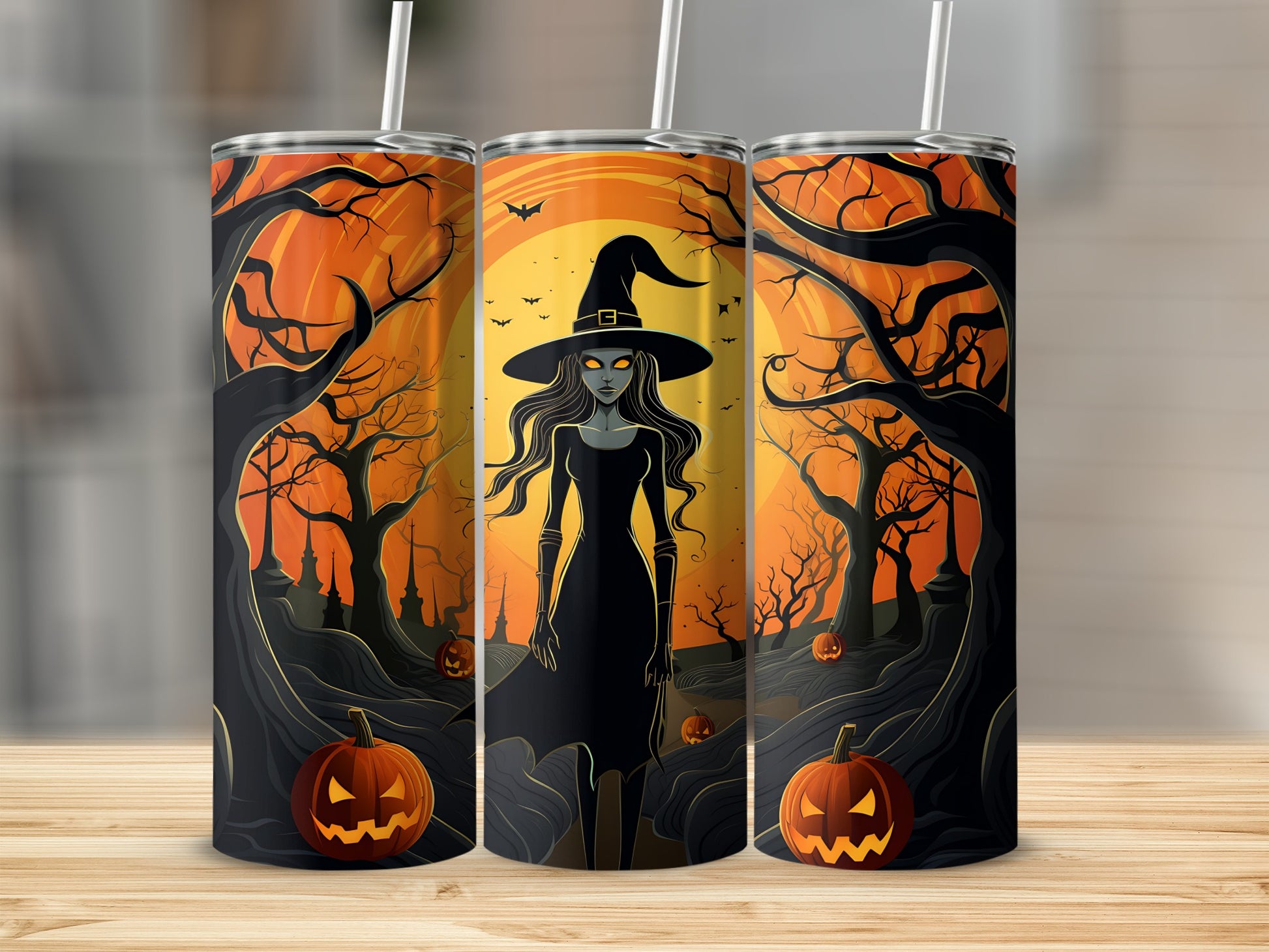 Three tumblers with a Halloween witch and jack-o'-lantern forest scene design.