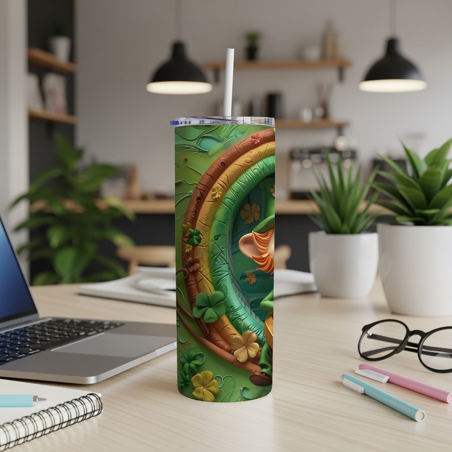 Green tumbler with shamrocks, a rainbow arch, and a leprechaun.