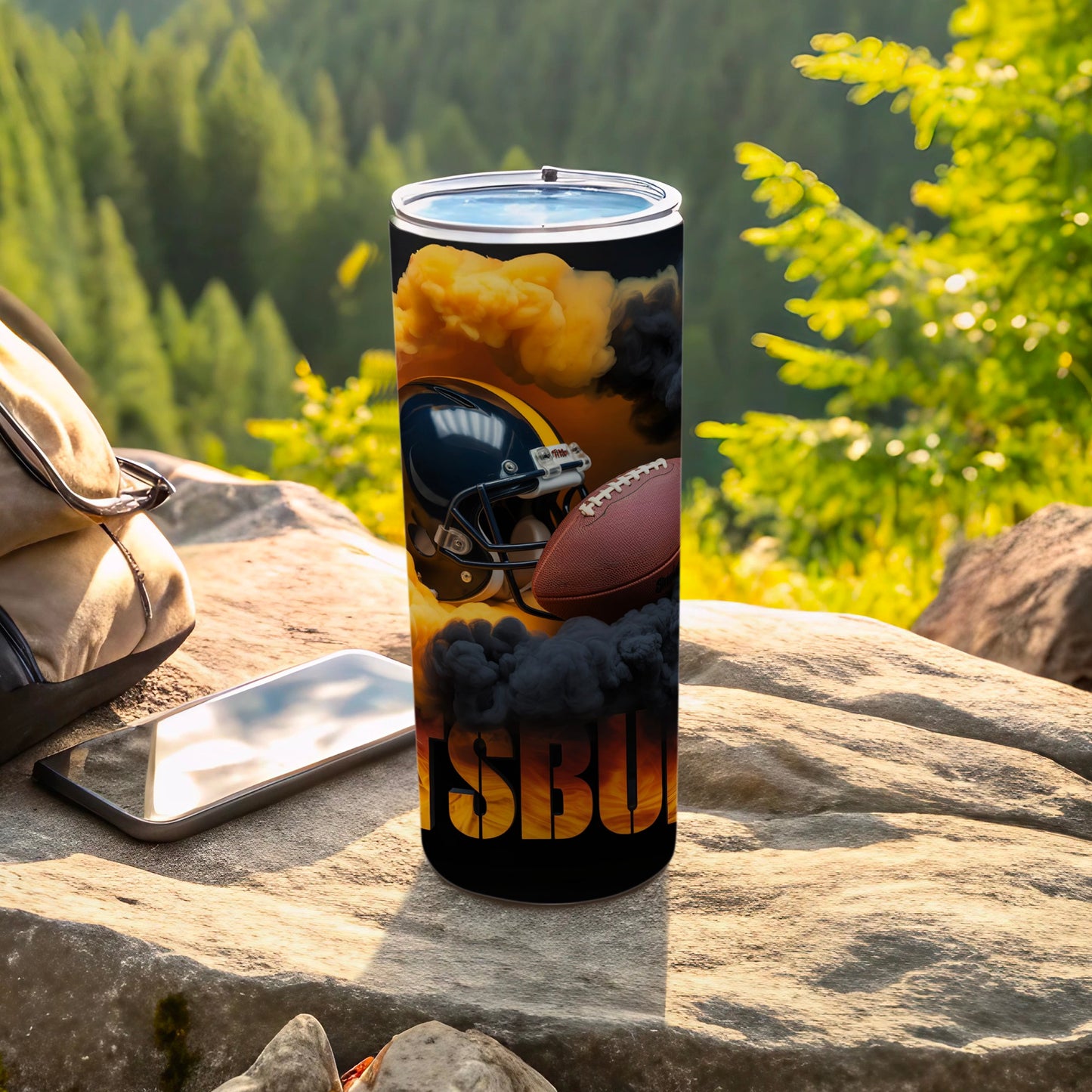 Football helmet and ball on a tumbler with "SBUI" text.