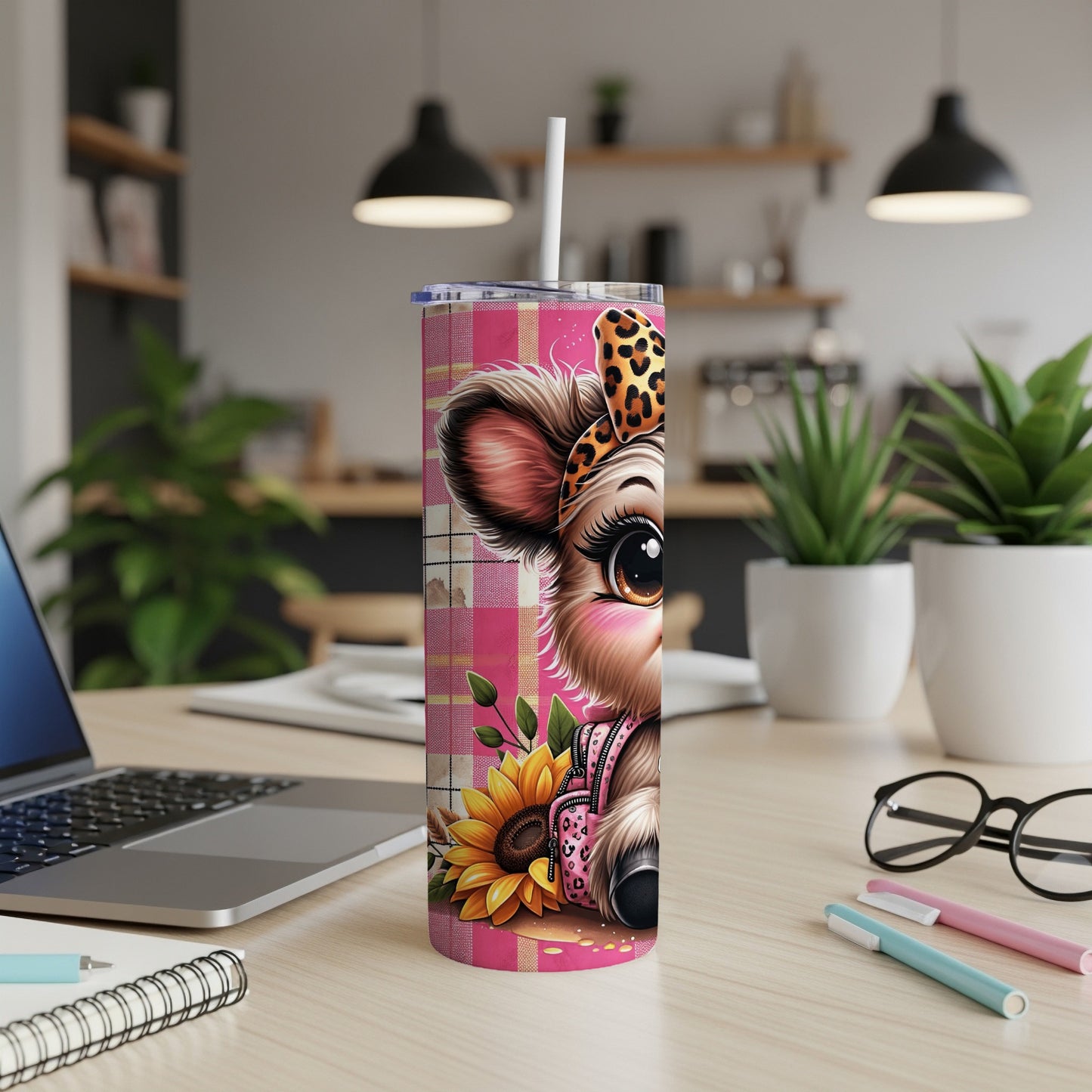 Pink plaid tumbler with a cute cow design and sunflower.