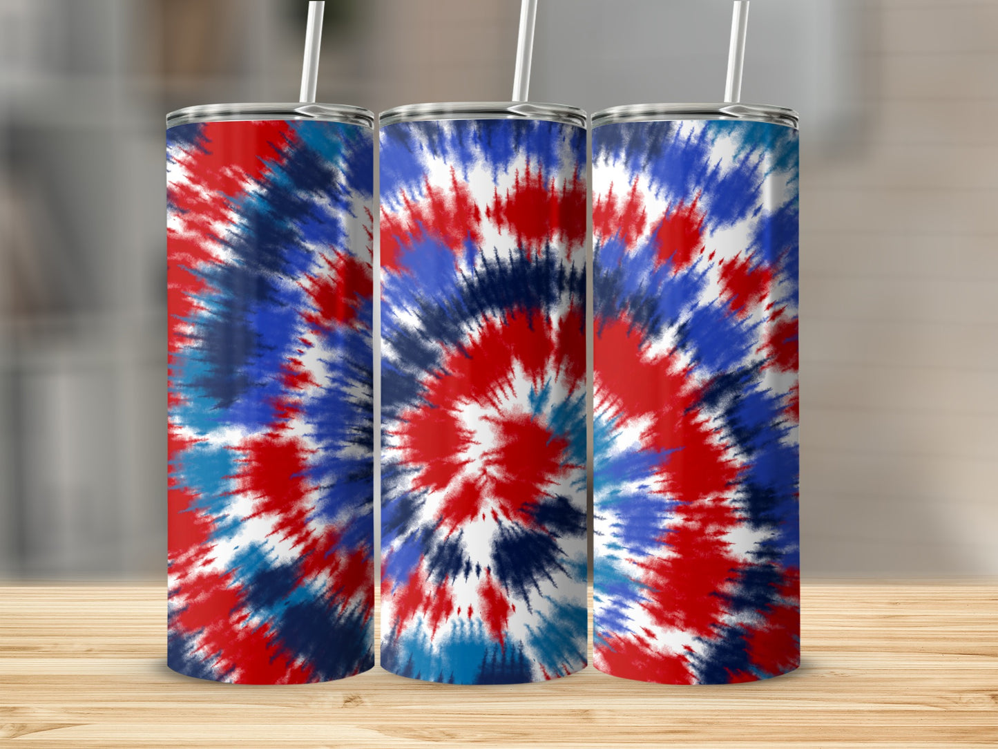 Three tumblers with red, white, and blue tie-dye pattern and straws.