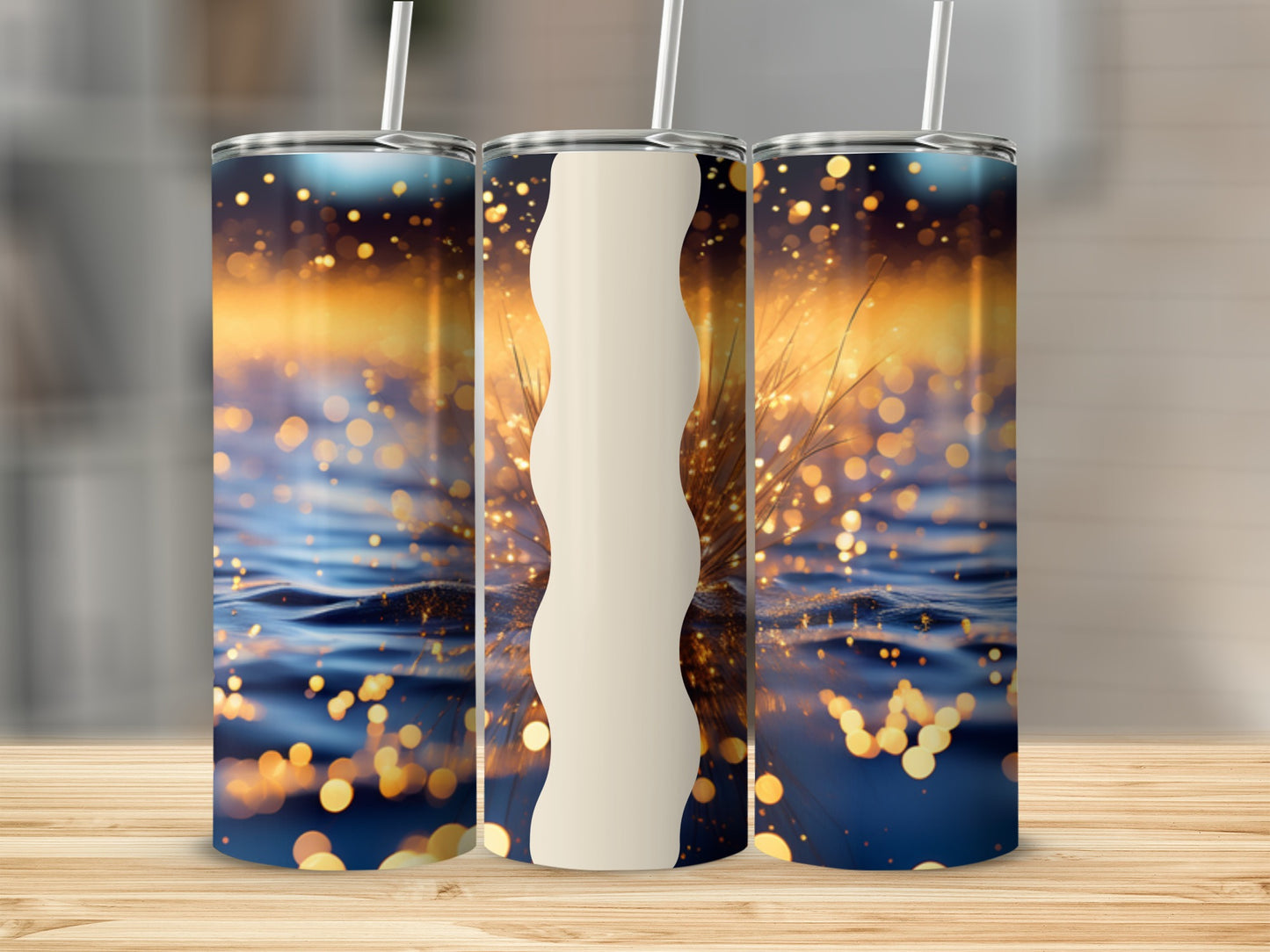 Three tumblers with a blurry bokeh background of water and lights.