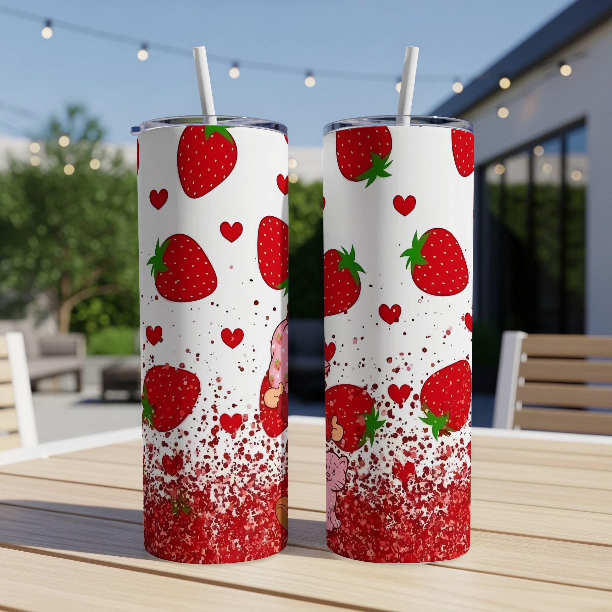 Two tumblers with strawberries, hearts, and a pink gnome design.